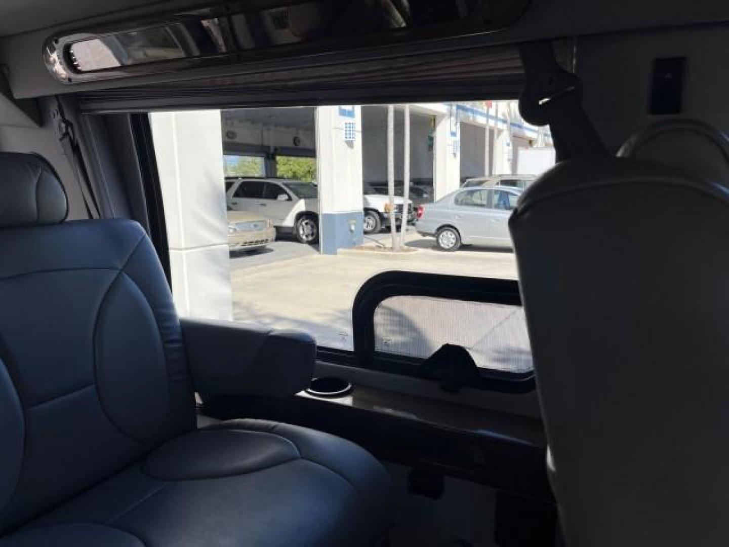 2008 Dark Shadow Grey Metallic /Medium flint Ford Econoline CONVERSION Van TUSCANY CONV LOW MILES 85,653 (1FDNE14W78D) with an 4.6L SOHC EFI V8 Triton Engine engine, Automatic transmission, located at 4701 North Dixie Hwy, Pompano Beach, FL, 33064, (954) 422-2889, 26.240938, -80.123474 - 2008 FORD ECONOLINE E150 TUSCANY CONVERSION ROAD READY 4.6L V8 VIN: 1FDNE14W78DA12545 NO ACCIDENTS NO RECALLS VAN POWER LEATHER SEATS 4.6L V8 F SOHC 16V POWER MIRRORS GASOLINE DVD ENTERTAINMENT 4 SERVICE RECORDS REAR WHEEL DRIVE BACK UP SENSORS LOW MILES 85,653 THIS IS ONE OF THE NICEST FORD CONVERS - Photo#34