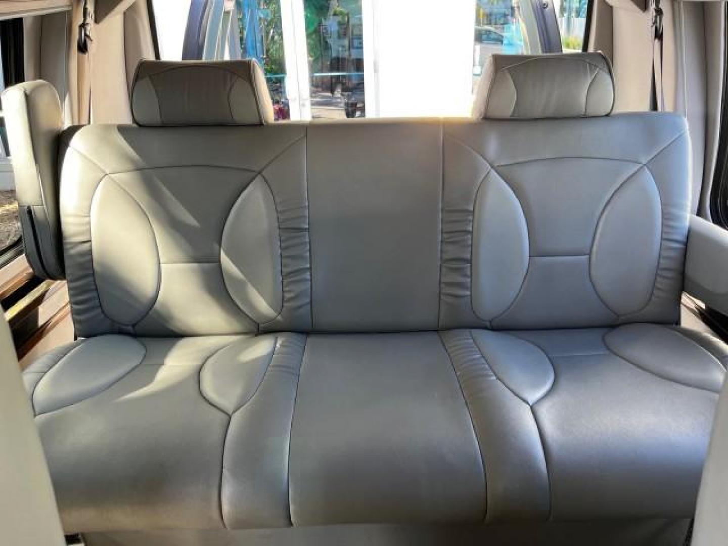 2008 Dark Shadow Grey Metallic /Medium flint Ford Econoline CONVERSION Van TUSCANY CONV LOW MILES 85,653 (1FDNE14W78D) with an 4.6L SOHC EFI V8 Triton Engine engine, Automatic transmission, located at 4701 North Dixie Hwy, Pompano Beach, FL, 33064, (954) 422-2889, 26.240938, -80.123474 - 2008 FORD ECONOLINE E150 TUSCANY CONVERSION ROAD READY 4.6L V8 VIN: 1FDNE14W78DA12545 NO ACCIDENTS NO RECALLS VAN POWER LEATHER SEATS 4.6L V8 F SOHC 16V POWER MIRRORS GASOLINE DVD ENTERTAINMENT 4 SERVICE RECORDS REAR WHEEL DRIVE BACK UP SENSORS LOW MILES 85,653 THIS IS ONE OF THE NICEST FORD CONVERS - Photo#39