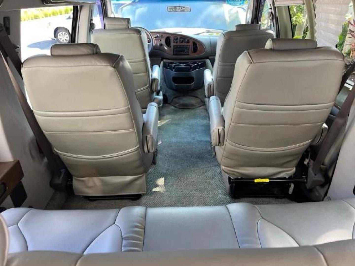 2008 Dark Shadow Grey Metallic /Medium flint Ford Econoline CONVERSION Van TUSCANY CONV LOW MILES 85,653 (1FDNE14W78D) with an 4.6L SOHC EFI V8 Triton Engine engine, Automatic transmission, located at 4701 North Dixie Hwy, Pompano Beach, FL, 33064, (954) 422-2889, 26.240938, -80.123474 - 2008 FORD ECONOLINE E150 TUSCANY CONVERSION ROAD READY 4.6L V8 VIN: 1FDNE14W78DA12545 NO ACCIDENTS NO RECALLS VAN POWER LEATHER SEATS 4.6L V8 F SOHC 16V POWER MIRRORS GASOLINE DVD ENTERTAINMENT 4 SERVICE RECORDS REAR WHEEL DRIVE BACK UP SENSORS LOW MILES 85,653 THIS IS ONE OF THE NICEST FORD CONVERS - Photo#71