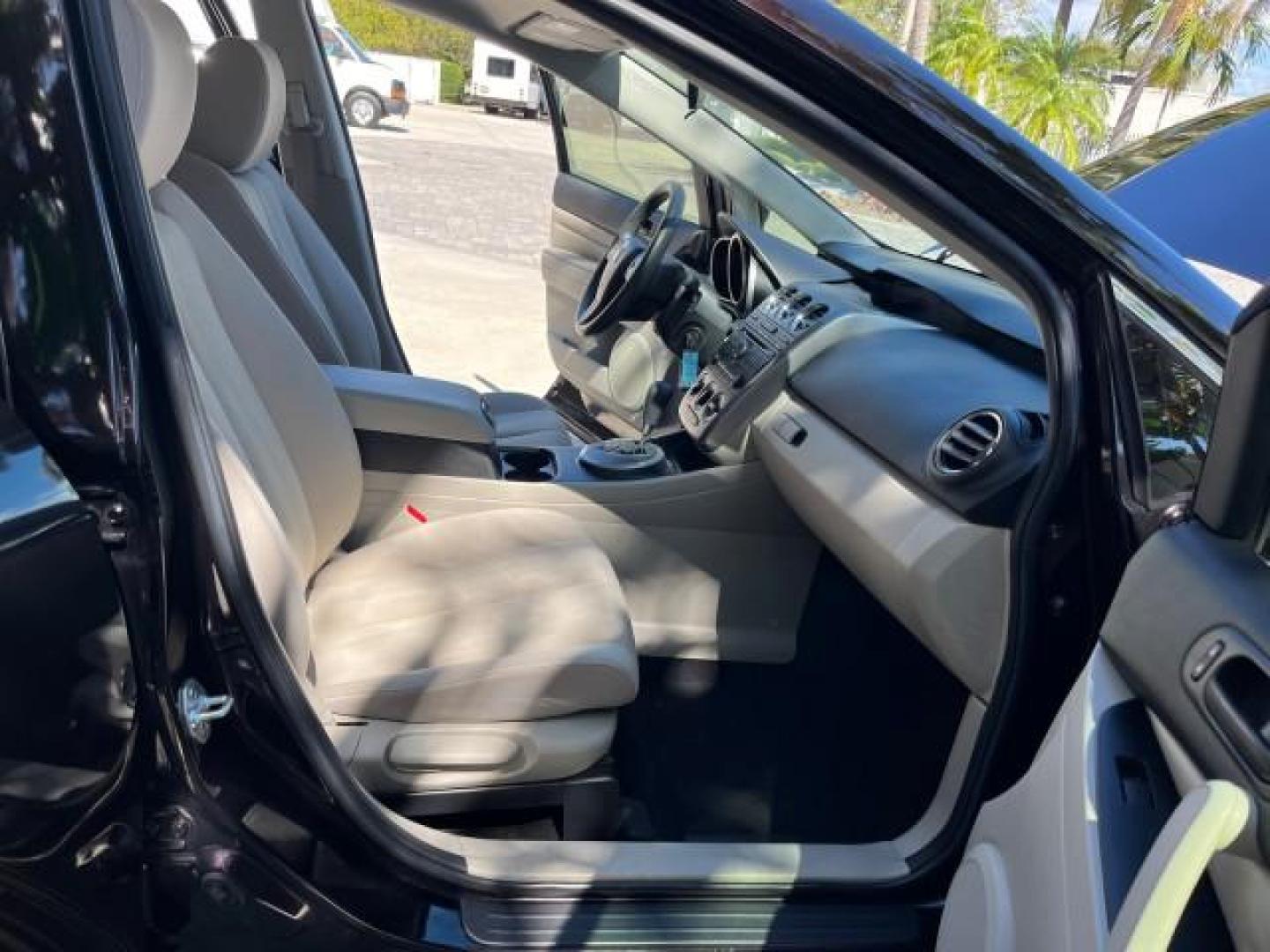 2011 Black Cherry Mica /Black Mazda CX-7 1 FL i SV LOW MILES 59,855 (JM3ER2A5XB0) with an 2.5L DOHC 16-Valve VVT I4 Engine engine, Automatic transmission, located at 4701 North Dixie Hwy, Pompano Beach, FL, 33064, (954) 422-2889, 26.240938, -80.123474 - 2011 MAZDA CX-7 I SV ROAD READY 2.5L I4 VIN: JM3ER2A5XB0409487 NO ACCIDENTS 28 MPG 4 DOOR WAGON/SPORT UTILITY NO RECALLS 2.5L I4 F DOHC 16V 1 OWNER FLORIDA GASOLINE LOW MILES 59,855 FRONT WHEEL DRIVE 18 SERVICE RECORDS Alloy Wheels Anti-Theft System Approach Lights Braking Assist Cruise Control Curt - Photo#12