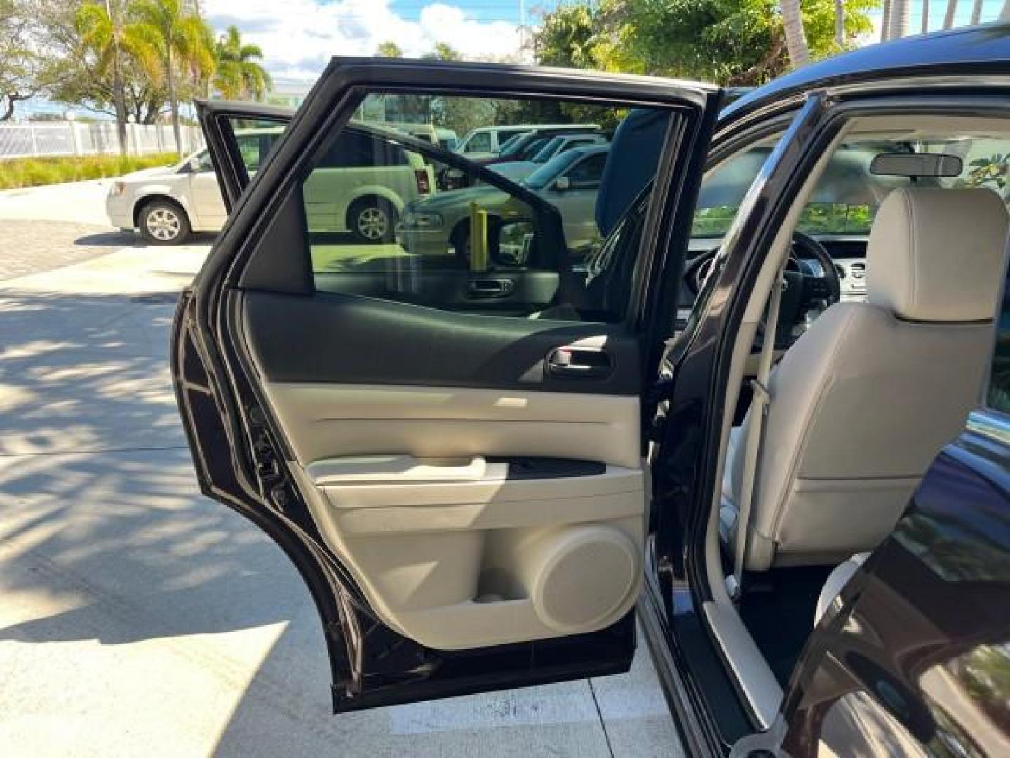 2011 Black Cherry Mica /Black Mazda CX-7 1 FL i SV LOW MILES 59,855 (JM3ER2A5XB0) with an 2.5L DOHC 16-Valve VVT I4 Engine engine, Automatic transmission, located at 4701 North Dixie Hwy, Pompano Beach, FL, 33064, (954) 422-2889, 26.240938, -80.123474 - 2011 MAZDA CX-7 I SV ROAD READY 2.5L I4 VIN: JM3ER2A5XB0409487 NO ACCIDENTS 28 MPG 4 DOOR WAGON/SPORT UTILITY NO RECALLS 2.5L I4 F DOHC 16V 1 OWNER FLORIDA GASOLINE LOW MILES 59,855 FRONT WHEEL DRIVE 18 SERVICE RECORDS Alloy Wheels Anti-Theft System Approach Lights Braking Assist Cruise Control Curt - Photo#13