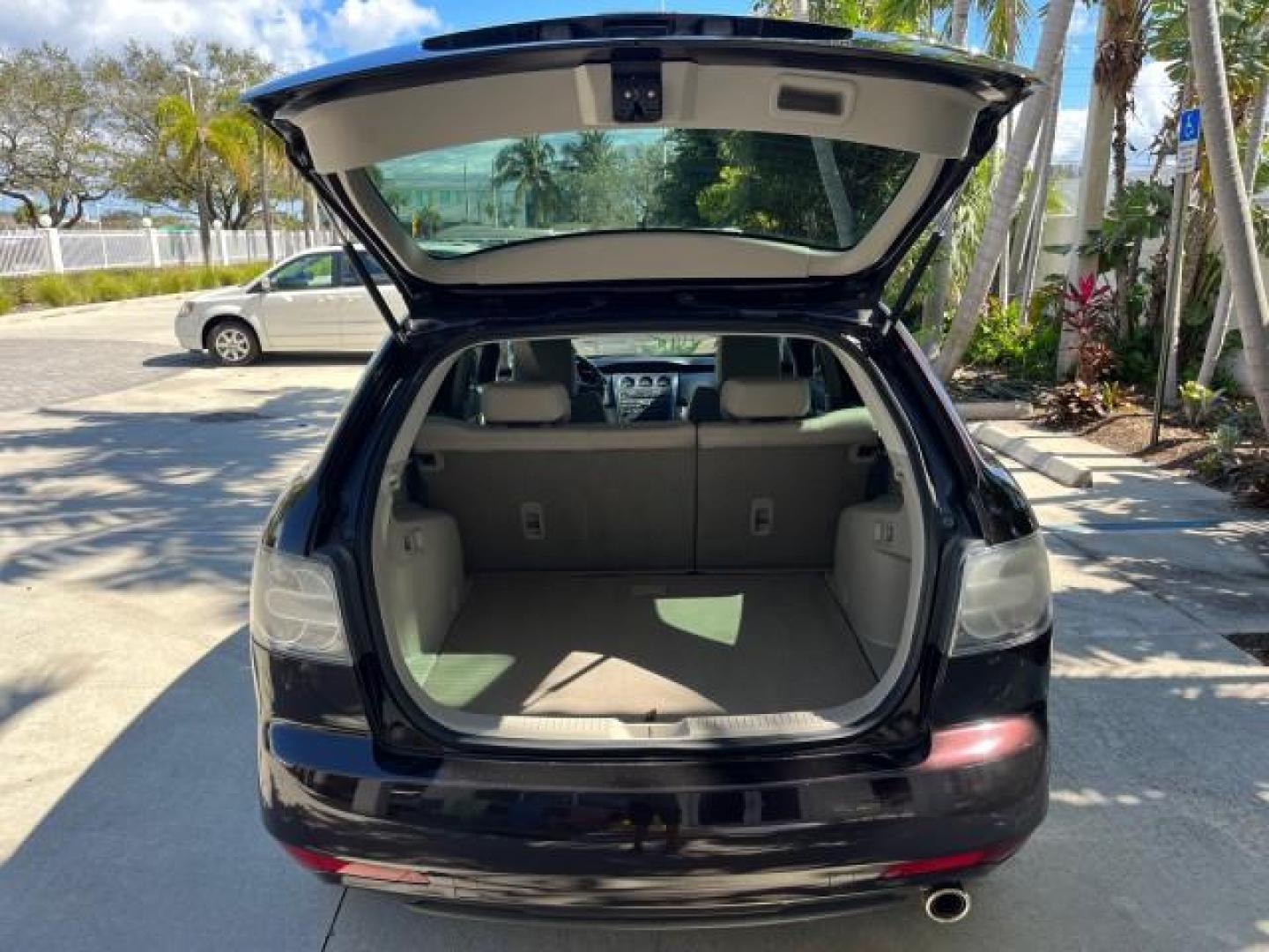 2011 Black Cherry Mica /Black Mazda CX-7 1 FL i SV LOW MILES 59,855 (JM3ER2A5XB0) with an 2.5L DOHC 16-Valve VVT I4 Engine engine, Automatic transmission, located at 4701 North Dixie Hwy, Pompano Beach, FL, 33064, (954) 422-2889, 26.240938, -80.123474 - 2011 MAZDA CX-7 I SV ROAD READY 2.5L I4 VIN: JM3ER2A5XB0409487 NO ACCIDENTS 28 MPG 4 DOOR WAGON/SPORT UTILITY NO RECALLS 2.5L I4 F DOHC 16V 1 OWNER FLORIDA GASOLINE LOW MILES 59,855 FRONT WHEEL DRIVE 18 SERVICE RECORDS Alloy Wheels Anti-Theft System Approach Lights Braking Assist Cruise Control Curt - Photo#59