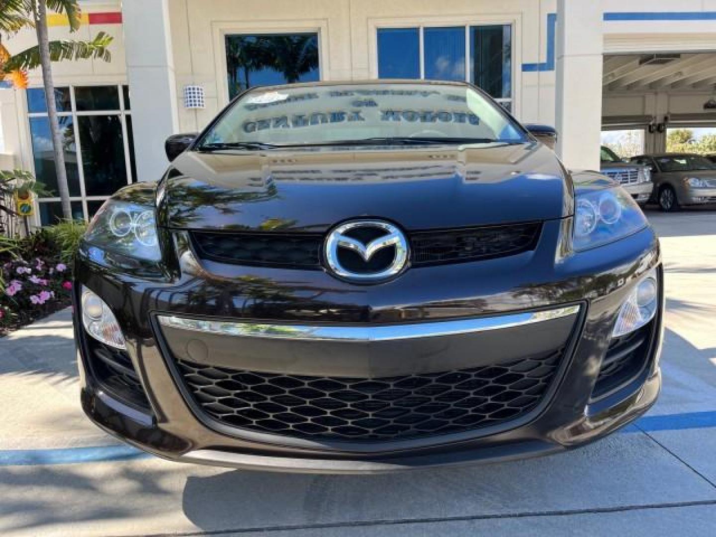 2011 Black Cherry Mica /Black Mazda CX-7 1 FL i SV LOW MILES 59,855 (JM3ER2A5XB0) with an 2.5L DOHC 16-Valve VVT I4 Engine engine, Automatic transmission, located at 4701 North Dixie Hwy, Pompano Beach, FL, 33064, (954) 422-2889, 26.240938, -80.123474 - 2011 MAZDA CX-7 I SV ROAD READY 2.5L I4 VIN: JM3ER2A5XB0409487 NO ACCIDENTS 28 MPG 4 DOOR WAGON/SPORT UTILITY NO RECALLS 2.5L I4 F DOHC 16V 1 OWNER FLORIDA GASOLINE LOW MILES 59,855 FRONT WHEEL DRIVE 18 SERVICE RECORDS Alloy Wheels Anti-Theft System Approach Lights Braking Assist Cruise Control Curt - Photo#80