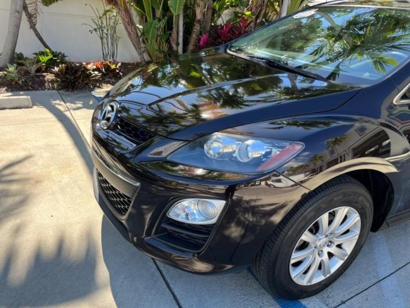 2011 Black Cherry Mica /Black Mazda CX-7 1 FL i SV LOW MILES 59,855 (JM3ER2A5XB0) with an 2.5L DOHC 16-Valve VVT I4 Engine engine, Automatic transmission, located at 4701 North Dixie Hwy, Pompano Beach, FL, 33064, (954) 422-2889, 26.240938, -80.123474 - 2011 MAZDA CX-7 I SV ROAD READY 2.5L I4 VIN: JM3ER2A5XB0409487 NO ACCIDENTS 28 MPG 4 DOOR WAGON/SPORT UTILITY NO RECALLS 2.5L I4 F DOHC 16V 1 OWNER FLORIDA GASOLINE LOW MILES 59,855 FRONT WHEEL DRIVE 18 SERVICE RECORDS Alloy Wheels Anti-Theft System Approach Lights Braking Assist Cruise Control Curt - Photo#83