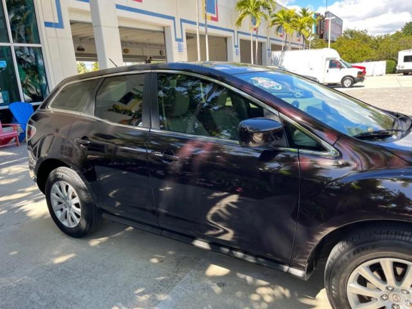 2011 Black Cherry Mica /Black Mazda CX-7 1 FL i SV LOW MILES 59,855 (JM3ER2A5XB0) with an 2.5L DOHC 16-Valve VVT I4 Engine engine, Automatic transmission, located at 4701 North Dixie Hwy, Pompano Beach, FL, 33064, (954) 422-2889, 26.240938, -80.123474 - 2011 MAZDA CX-7 I SV ROAD READY 2.5L I4 VIN: JM3ER2A5XB0409487 NO ACCIDENTS 28 MPG 4 DOOR WAGON/SPORT UTILITY NO RECALLS 2.5L I4 F DOHC 16V 1 OWNER FLORIDA GASOLINE LOW MILES 59,855 FRONT WHEEL DRIVE 18 SERVICE RECORDS Alloy Wheels Anti-Theft System Approach Lights Braking Assist Cruise Control Curt - Photo#85