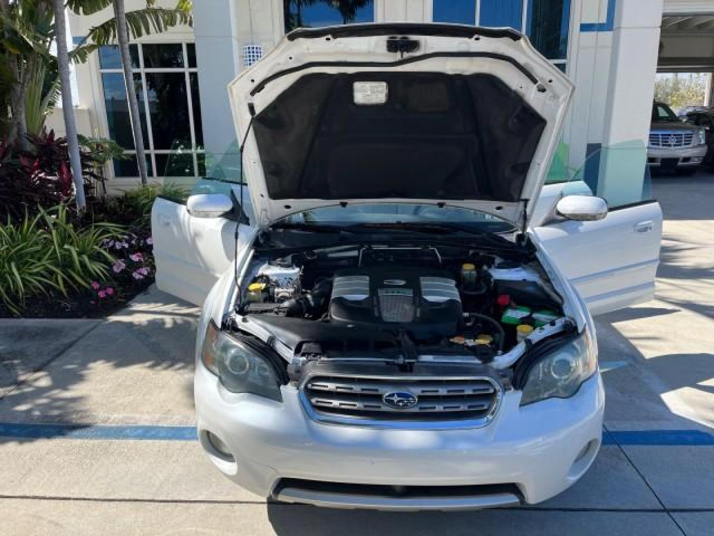 2005 Satin White Pearl /Taupe Subaru Legacy Sedan (Natl) Outback R LOW MILES 60.946 (4S4BL84C554) with an 3.0L DOHC SMPI 24-Valve High-Output 6-Cyl Boxer Engine engine, Automatic transmission, located at 4701 North Dixie Hwy, Pompano Beach, FL, 33064, (954) 422-2889, 26.240938, -80.123474 - 2005 SUBARU OUTBACK 3.0 R ROAD READY 3.0L V6 VIN: 4S4BL84C554207322 NO ACCIDENTS AWD SEDAN 4 DR FLORIDA OWNER 3.0L H6 F DOHC 24V AWD HEATED LEATHER SEATS GASOLINE 14 SERVICE RECORDS POWER SUNROOF ALL WHEEL DRIVE LOW MILES 60,946 DUAL ZONE AC AWD Alloy Wheels Anti-Theft System Automatic Climate Contr - Photo#16