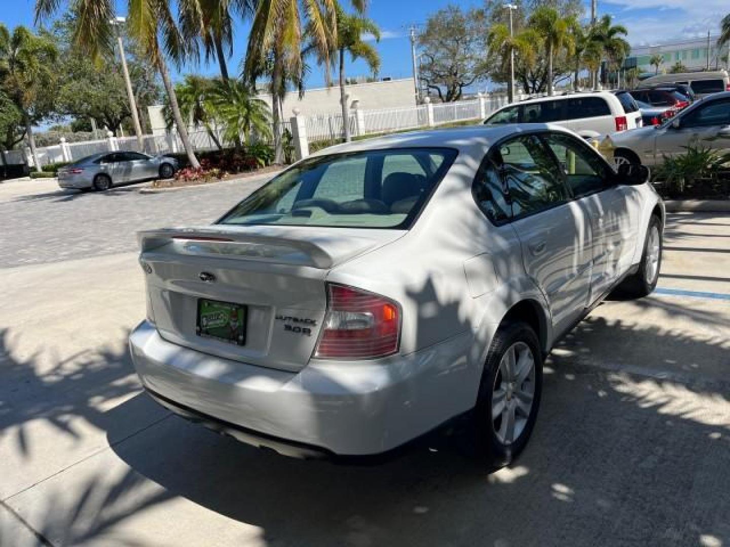 2005 Satin White Pearl /Taupe Subaru Legacy Sedan (Natl) Outback R LOW MILES 60.946 (4S4BL84C554) with an 3.0L DOHC SMPI 24-Valve High-Output 6-Cyl Boxer Engine engine, Automatic transmission, located at 4701 North Dixie Hwy, Pompano Beach, FL, 33064, (954) 422-2889, 26.240938, -80.123474 - 2005 SUBARU OUTBACK 3.0 R ROAD READY 3.0L V6 VIN: 4S4BL84C554207322 NO ACCIDENTS AWD SEDAN 4 DR FLORIDA OWNER 3.0L H6 F DOHC 24V AWD HEATED LEATHER SEATS GASOLINE 14 SERVICE RECORDS POWER SUNROOF ALL WHEEL DRIVE LOW MILES 60,946 DUAL ZONE AC AWD Alloy Wheels Anti-Theft System Automatic Climate Contr - Photo#7