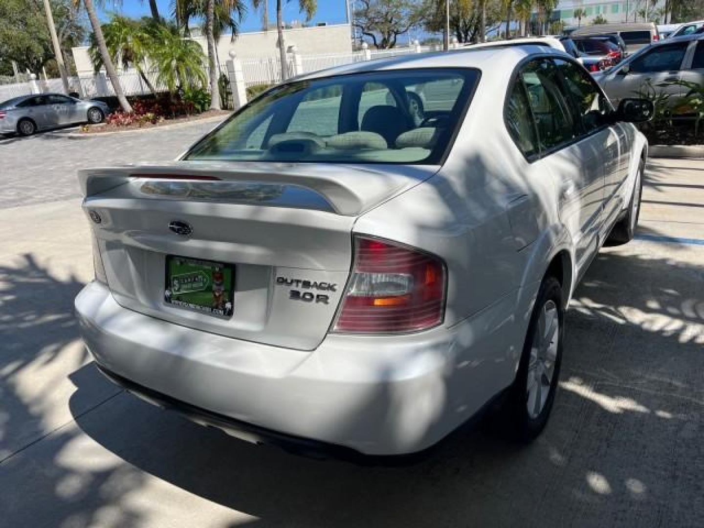 2005 Satin White Pearl /Taupe Subaru Legacy Sedan (Natl) Outback R LOW MILES 60.946 (4S4BL84C554) with an 3.0L DOHC SMPI 24-Valve High-Output 6-Cyl Boxer Engine engine, Automatic transmission, located at 4701 North Dixie Hwy, Pompano Beach, FL, 33064, (954) 422-2889, 26.240938, -80.123474 - 2005 SUBARU OUTBACK 3.0 R ROAD READY 3.0L V6 VIN: 4S4BL84C554207322 NO ACCIDENTS AWD SEDAN 4 DR FLORIDA OWNER 3.0L H6 F DOHC 24V AWD HEATED LEATHER SEATS GASOLINE 14 SERVICE RECORDS POWER SUNROOF ALL WHEEL DRIVE LOW MILES 60,946 DUAL ZONE AC AWD Alloy Wheels Anti-Theft System Automatic Climate Contr - Photo#95