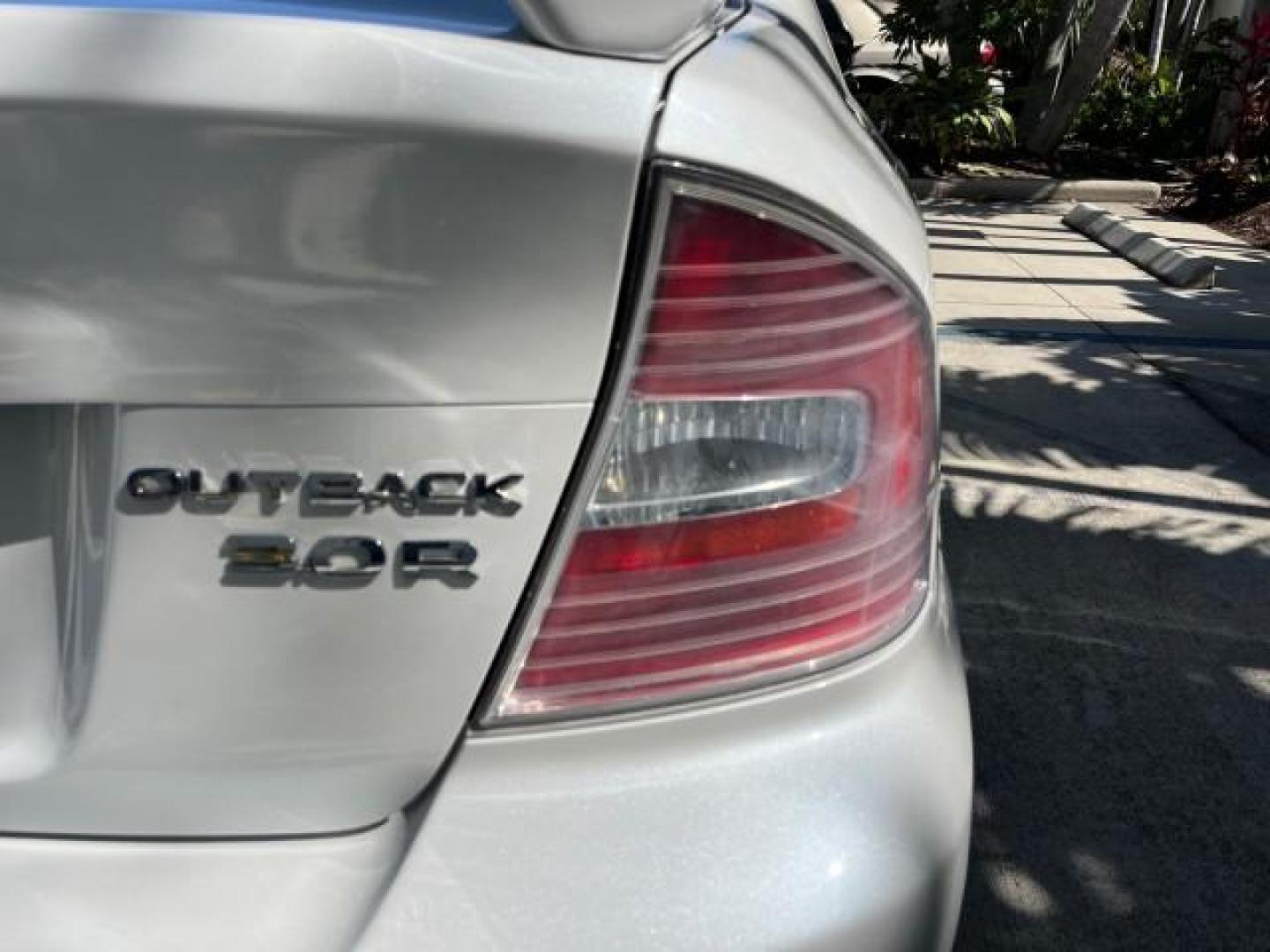 2005 Satin White Pearl /Taupe Subaru Legacy Sedan (Natl) Outback R LOW MILES 60.946 (4S4BL84C554) with an 3.0L DOHC SMPI 24-Valve High-Output 6-Cyl Boxer Engine engine, Automatic transmission, located at 4701 North Dixie Hwy, Pompano Beach, FL, 33064, (954) 422-2889, 26.240938, -80.123474 - 2005 SUBARU OUTBACK 3.0 R ROAD READY 3.0L V6 VIN: 4S4BL84C554207322 NO ACCIDENTS AWD SEDAN 4 DR FLORIDA OWNER 3.0L H6 F DOHC 24V AWD HEATED LEATHER SEATS GASOLINE 14 SERVICE RECORDS POWER SUNROOF ALL WHEEL DRIVE LOW MILES 60,946 DUAL ZONE AC AWD Alloy Wheels Anti-Theft System Automatic Climate Contr - Photo#96