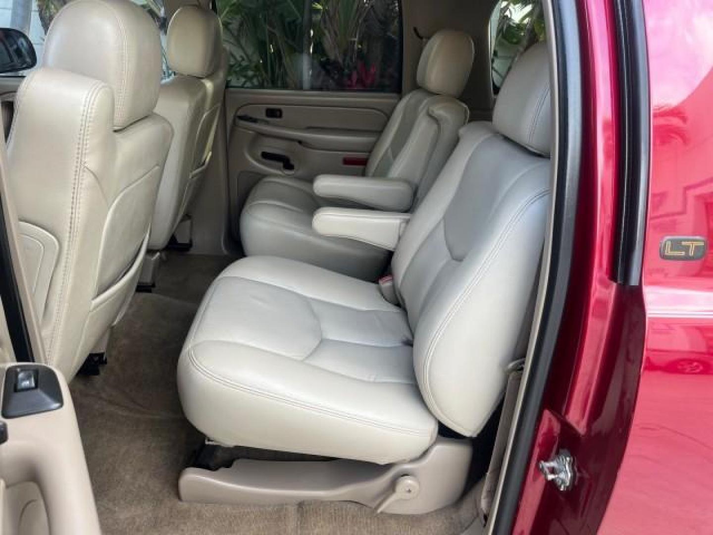 2004 Sport Red Metallic /Tan/Neutral Chevrolet Suburban LT LOW MILES 71,383 (3GNEC16Z84G) with an 5.3L Vortec 5300 V8 SFI Flex-Fuel Engine engine, Automatic transmission, located at 4701 North Dixie Hwy, Pompano Beach, FL, 33064, (954) 422-2889, 26.240938, -80.123474 - 2004 CHEVROLET SUBURBAN 1500 LT NEW $47,051 ROAD READY VIN: 3GNEC16Z84G299609 NO ACCIDENTS NO RECALLS 4 DOOR WAGON/SPORT UTILITY FLORIDA OWNER 5.3L V8 5.3L V8 F POWER SUNROOF/SEATS FLEX FUEL POWER MIRRORS LOW MILES 71,383 LEATHER REAR WHEEL DRIVE DUAL ZONE AC 23 SERVICE RECORDS 1SM Package Adjustabl - Photo#35