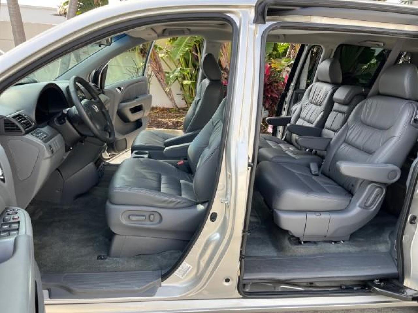 2007 Silver Pearl Metallic /Gray Honda Odyssey 1 EX-L LOW MILES 57,826 (5FNRL38777B) with an 3.5L SOHC MPFI 24-Valve i-VTEC V6 Engine engine, Automatic transmission, located at 4701 North Dixie Hwy, Pompano Beach, FL, 33064, (954) 422-2889, 26.240938, -80.123474 - 2007 HONDA ODYSSEY EX-L W/DVD NEW $35,106 ROAD READY VIN: 5FNRL38777B460172 NO ACCIDENTS NO RECALLS VAN 3 ROW SEATS 1 OWNER DUAL AC 3.5L V6 3.5L V6 F SOHC 24V LOW MILES 57,826 POWER SLIDING DOORS GASOLINE POWER MIRRORS POWER HEATED LEATHER SEATS FRONT WHEEL DRIVE POWER SUNROOF DVD VIDEO SYSTEM Anti- - Photo#10