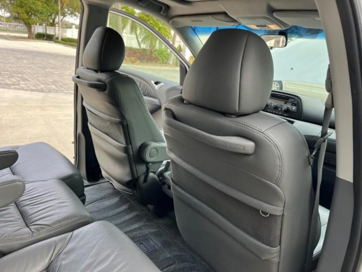 2007 Silver Pearl Metallic /Gray Honda Odyssey 1 EX-L LOW MILES 57,826 (5FNRL38777B) with an 3.5L SOHC MPFI 24-Valve i-VTEC V6 Engine engine, Automatic transmission, located at 4701 North Dixie Hwy, Pompano Beach, FL, 33064, (954) 422-2889, 26.240938, -80.123474 - 2007 HONDA ODYSSEY EX-L W/DVD NEW $35,106 ROAD READY VIN: 5FNRL38777B460172 NO ACCIDENTS NO RECALLS VAN 3 ROW SEATS 1 OWNER DUAL AC 3.5L V6 3.5L V6 F SOHC 24V LOW MILES 57,826 POWER SLIDING DOORS GASOLINE POWER MIRRORS POWER HEATED LEATHER SEATS FRONT WHEEL DRIVE POWER SUNROOF DVD VIDEO SYSTEM Anti- - Photo#29