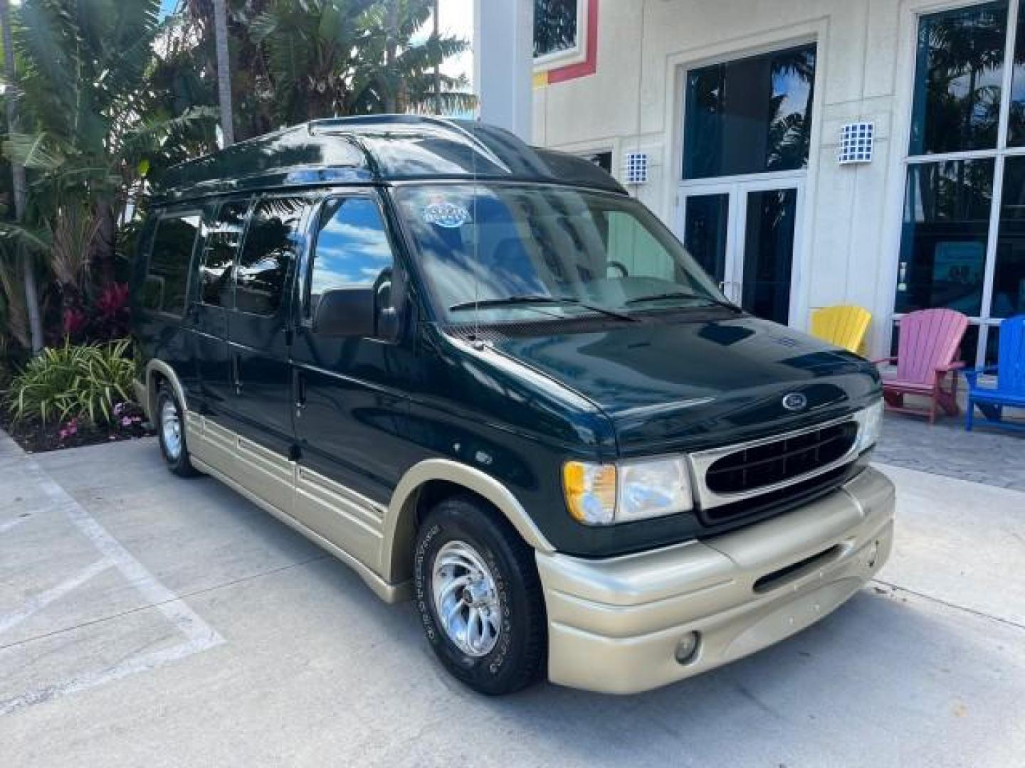 1999 Emerald Green Metallic /Medium Graphite Ford Econoline CONVERSION Van 1 FL LOW MILES 84,946 (1FDRE14L1XH) with an 5.4L SOHC SEFI V8 Triton Engine engine, Automatic transmission, located at 4701 North Dixie Hwy, Pompano Beach, FL, 33064, (954) 422-2889, 26.240938, -80.123474 - 1999 FORD ECONOLINE E150 ROAD READY TRAVEL READY VIN: 1FDRE14L1XHB78994 NO ACCIDENTS TV WITH VCR VAN NO RECALLS 5.4L V8 F SOHC 16V 1 OWNER FLORIDA 5.4L V8 GASOLINE STARCRAFT CONVERSION LOW MILES 84,946 REAR WHEEL DRIVE POWER LEATHER SEATS POPWER MIRRORS ABS Brakes AM/FM Stereo Air Conditioning Alloy - Photo#1