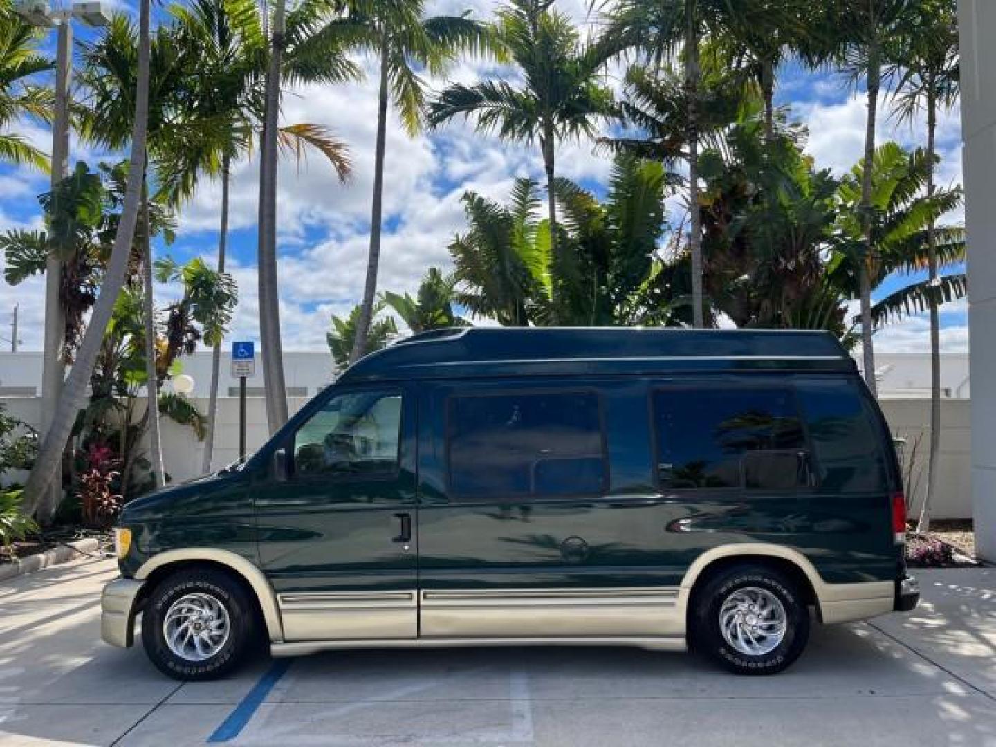 1999 Emerald Green Metallic /Medium Graphite Ford Econoline CONVERSION Van 1 FL LOW MILES 84,946 (1FDRE14L1XH) with an 5.4L SOHC SEFI V8 Triton Engine engine, Automatic transmission, located at 4701 North Dixie Hwy, Pompano Beach, FL, 33064, (954) 422-2889, 26.240938, -80.123474 - 1999 FORD ECONOLINE E150 ROAD READY TRAVEL READY VIN: 1FDRE14L1XHB78994 NO ACCIDENTS TV WITH VCR VAN NO RECALLS 5.4L V8 F SOHC 16V 1 OWNER FLORIDA 5.4L V8 GASOLINE STARCRAFT CONVERSION LOW MILES 84,946 REAR WHEEL DRIVE POWER LEATHER SEATS POPWER MIRRORS ABS Brakes AM/FM Stereo Air Conditioning Alloy - Photo#4