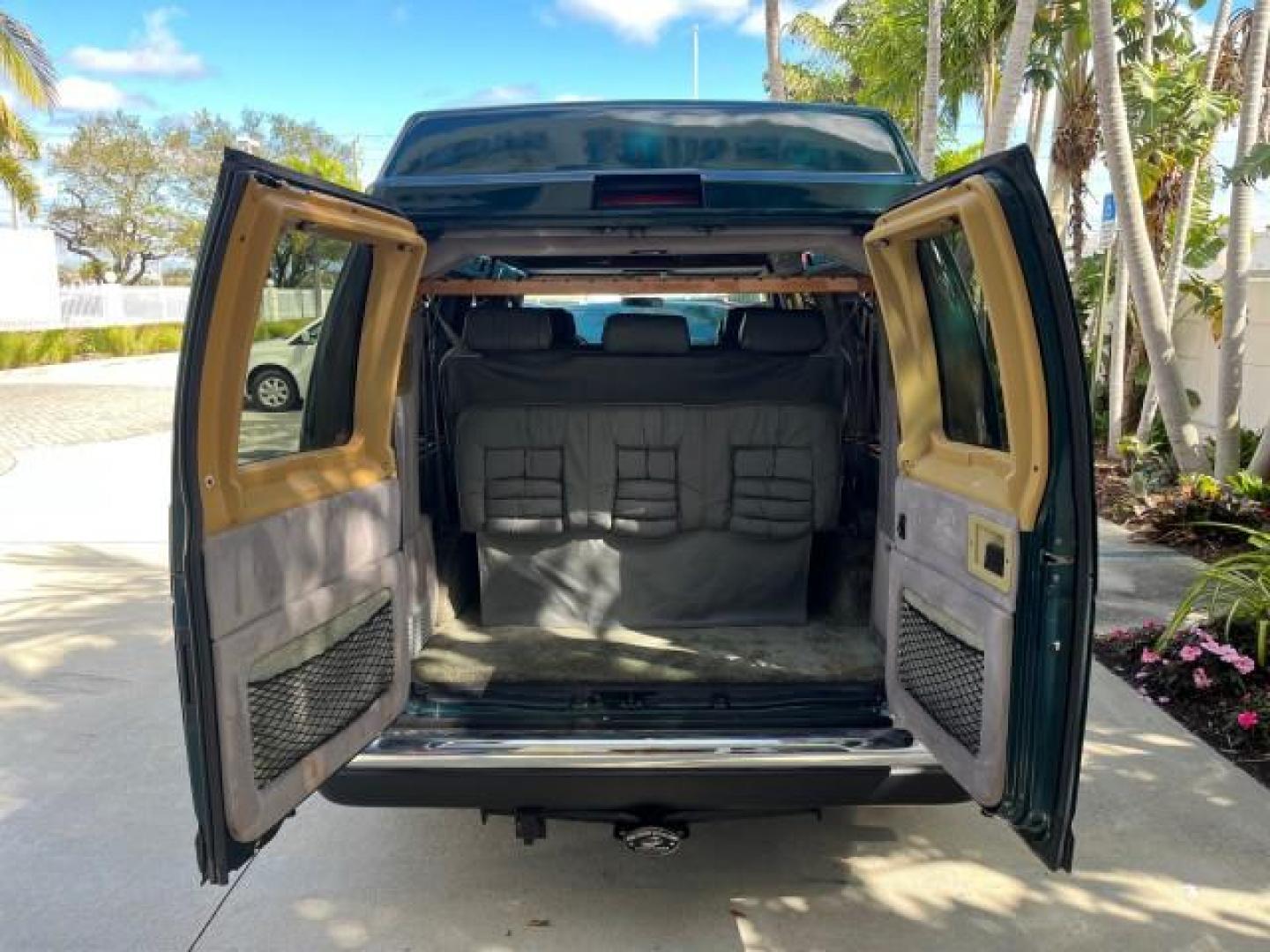 1999 Emerald Green Metallic /Medium Graphite Ford Econoline CONVERSION Van 1 FL LOW MILES 84,946 (1FDRE14L1XH) with an 5.4L SOHC SEFI V8 Triton Engine engine, Automatic transmission, located at 4701 North Dixie Hwy, Pompano Beach, FL, 33064, (954) 422-2889, 26.240938, -80.123474 - 1999 FORD ECONOLINE E150 ROAD READY TRAVEL READY VIN: 1FDRE14L1XHB78994 NO ACCIDENTS TV WITH VCR VAN NO RECALLS 5.4L V8 F SOHC 16V 1 OWNER FLORIDA 5.4L V8 GASOLINE STARCRAFT CONVERSION LOW MILES 84,946 REAR WHEEL DRIVE POWER LEATHER SEATS POPWER MIRRORS ABS Brakes AM/FM Stereo Air Conditioning Alloy - Photo#53