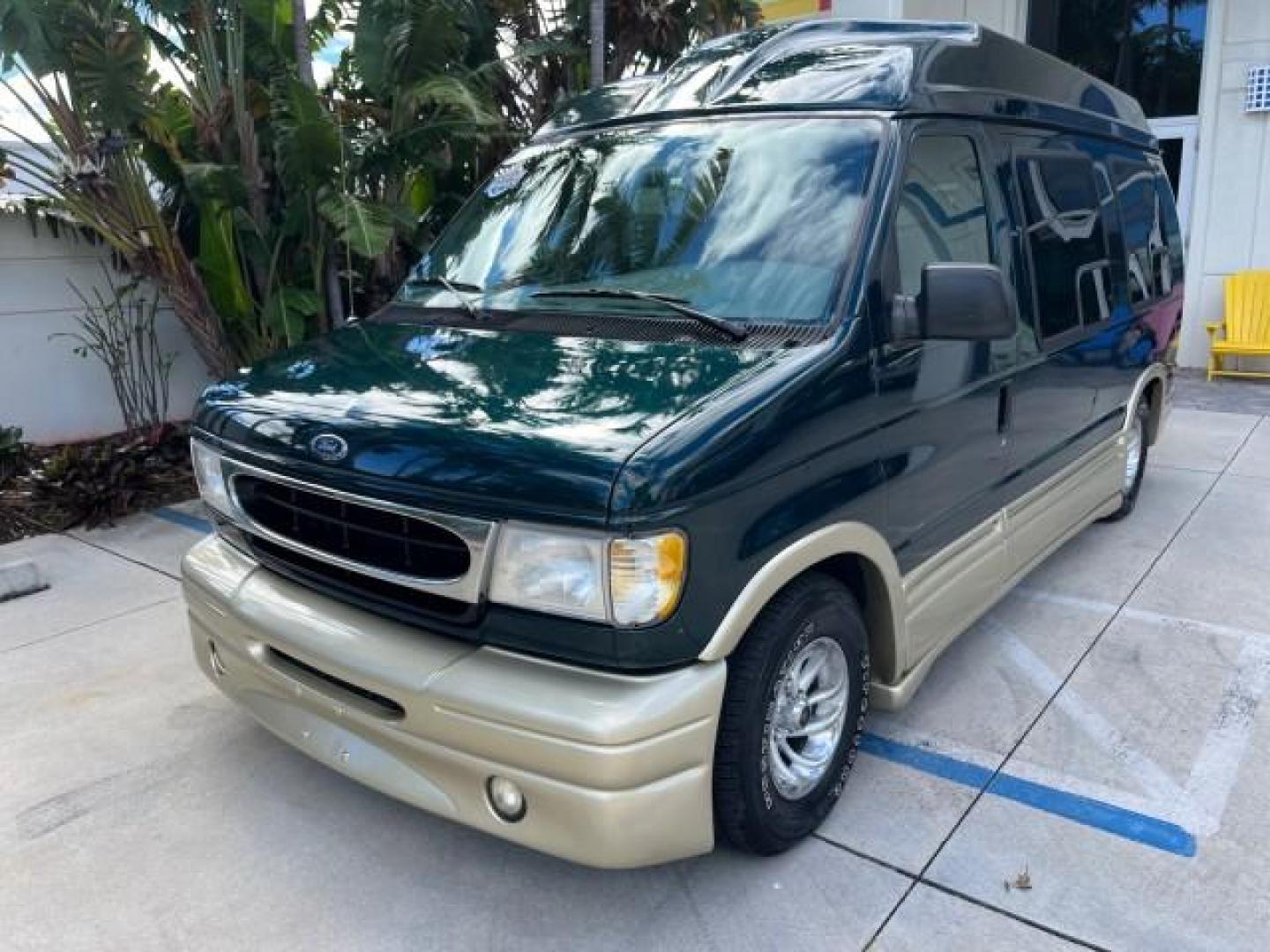 1999 Emerald Green Metallic /Medium Graphite Ford Econoline CONVERSION Van 1 FL LOW MILES 84,946 (1FDRE14L1XH) with an 5.4L SOHC SEFI V8 Triton Engine engine, Automatic transmission, located at 4701 North Dixie Hwy, Pompano Beach, FL, 33064, (954) 422-2889, 26.240938, -80.123474 - 1999 FORD ECONOLINE E150 ROAD READY TRAVEL READY VIN: 1FDRE14L1XHB78994 NO ACCIDENTS TV WITH VCR VAN NO RECALLS 5.4L V8 F SOHC 16V 1 OWNER FLORIDA 5.4L V8 GASOLINE STARCRAFT CONVERSION LOW MILES 84,946 REAR WHEEL DRIVE POWER LEATHER SEATS POPWER MIRRORS ABS Brakes AM/FM Stereo Air Conditioning Alloy - Photo#68