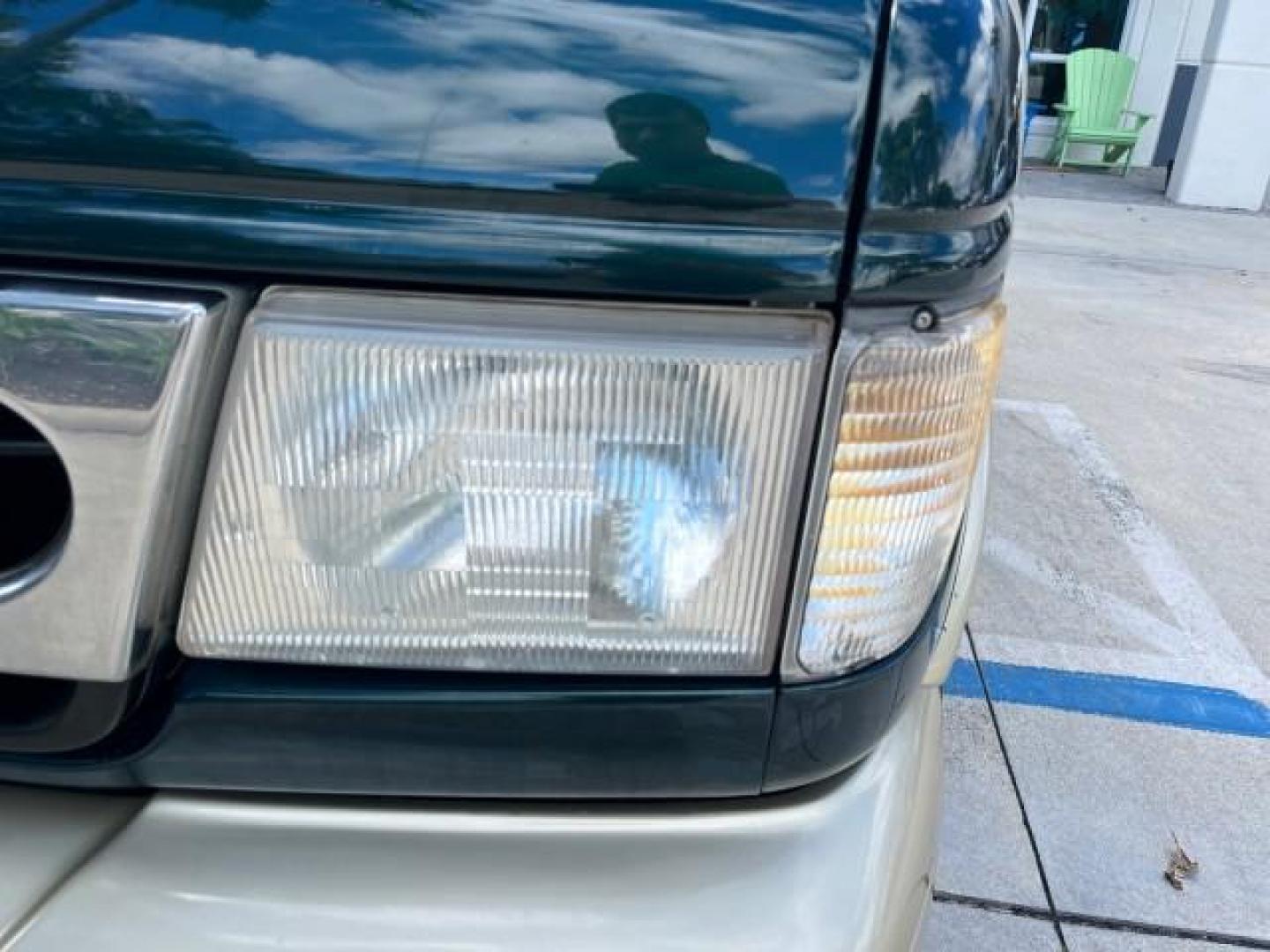 1999 Emerald Green Metallic /Medium Graphite Ford Econoline CONVERSION Van 1 FL LOW MILES 84,946 (1FDRE14L1XH) with an 5.4L SOHC SEFI V8 Triton Engine engine, Automatic transmission, located at 4701 North Dixie Hwy, Pompano Beach, FL, 33064, (954) 422-2889, 26.240938, -80.123474 - 1999 FORD ECONOLINE E150 ROAD READY TRAVEL READY VIN: 1FDRE14L1XHB78994 NO ACCIDENTS TV WITH VCR VAN NO RECALLS 5.4L V8 F SOHC 16V 1 OWNER FLORIDA 5.4L V8 GASOLINE STARCRAFT CONVERSION LOW MILES 84,946 REAR WHEEL DRIVE POWER LEATHER SEATS POPWER MIRRORS ABS Brakes AM/FM Stereo Air Conditioning Alloy - Photo#69