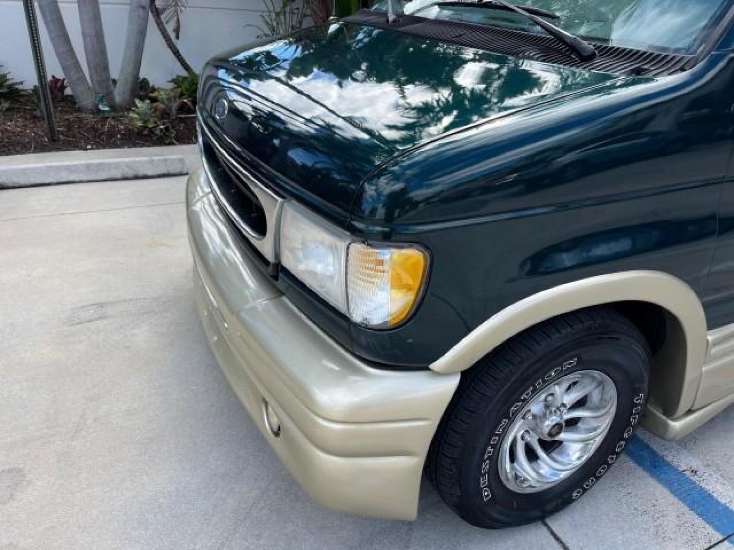 1999 Emerald Green Metallic /Medium Graphite Ford Econoline CONVERSION Van 1 FL LOW MILES 84,946 (1FDRE14L1XH) with an 5.4L SOHC SEFI V8 Triton Engine engine, Automatic transmission, located at 4701 North Dixie Hwy, Pompano Beach, FL, 33064, (954) 422-2889, 26.240938, -80.123474 - 1999 FORD ECONOLINE E150 ROAD READY TRAVEL READY VIN: 1FDRE14L1XHB78994 NO ACCIDENTS TV WITH VCR VAN NO RECALLS 5.4L V8 F SOHC 16V 1 OWNER FLORIDA 5.4L V8 GASOLINE STARCRAFT CONVERSION LOW MILES 84,946 REAR WHEEL DRIVE POWER LEATHER SEATS POPWER MIRRORS ABS Brakes AM/FM Stereo Air Conditioning Alloy - Photo#76