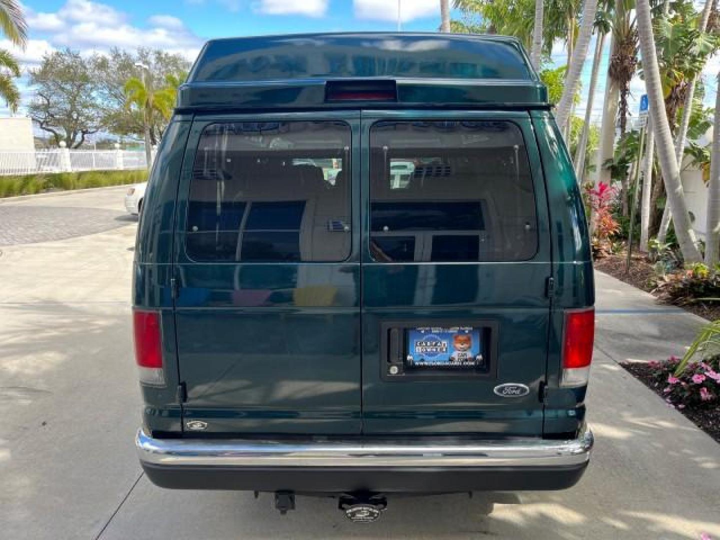 1999 Emerald Green Metallic /Medium Graphite Ford Econoline CONVERSION Van 1 FL LOW MILES 84,946 (1FDRE14L1XH) with an 5.4L SOHC SEFI V8 Triton Engine engine, Automatic transmission, located at 4701 North Dixie Hwy, Pompano Beach, FL, 33064, (954) 422-2889, 26.240938, -80.123474 - 1999 FORD ECONOLINE E150 ROAD READY TRAVEL READY VIN: 1FDRE14L1XHB78994 NO ACCIDENTS TV WITH VCR VAN NO RECALLS 5.4L V8 F SOHC 16V 1 OWNER FLORIDA 5.4L V8 GASOLINE STARCRAFT CONVERSION LOW MILES 84,946 REAR WHEEL DRIVE POWER LEATHER SEATS POPWER MIRRORS ABS Brakes AM/FM Stereo Air Conditioning Alloy - Photo#89