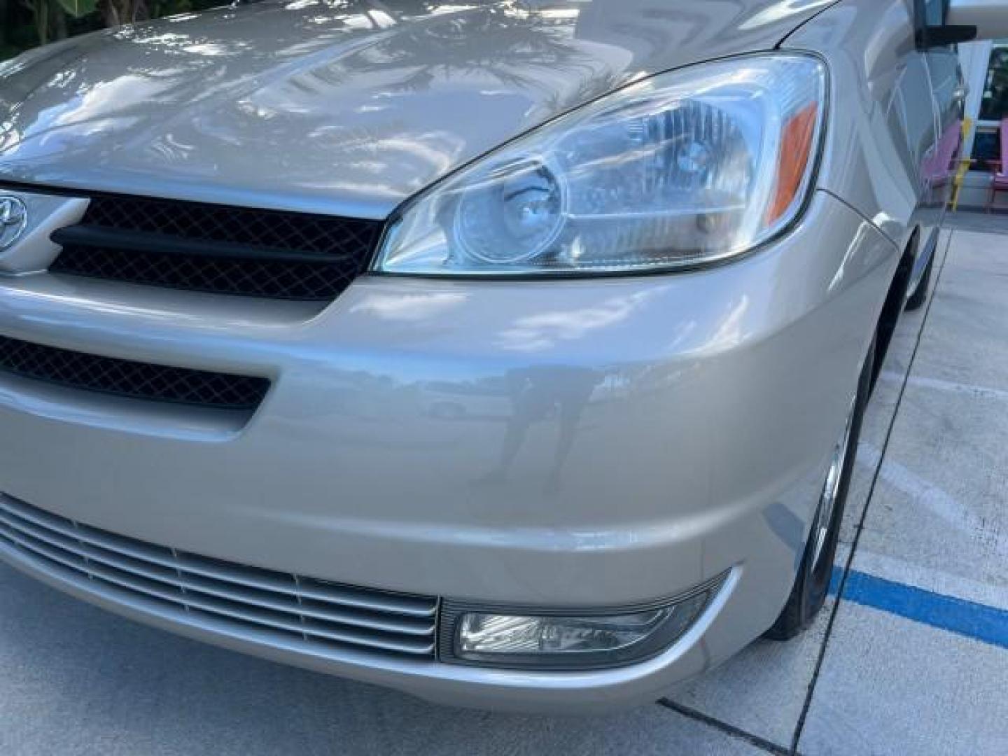 2004 Silver Shadow Pearl /Stone Toyota Sienna XLE 7 LOW MILES 55,737 (5TDZA22C54S) with an 3.3L 24-Valve MPFI DOHC VVT-i V6 Engine engine, Automatic transmission, located at 4701 North Dixie Hwy, Pompano Beach, FL, 33064, (954) 422-2889, 26.240938, -80.123474 - 2004 TOYOTA SIENNA XLE 7 PASSENGER NEW $33,585 ROAD READY VIN: 5TDZA22C54S212256 NO ACCIDENTS 3.3L V6 VAN DUAL ZONE AC LOW MILES 55,737 27 MPG 3.3L V6 F DOHC 24V JBL SOUND POWER SLIDING DOORS GASOLINE 7 PASSENGER POWER LIFTGATE LEATHER FRONT WHEEL DRIVE 3 ROW SEATS 18 SERVICE RECORDS XLE Alloy Wheel - Photo#94