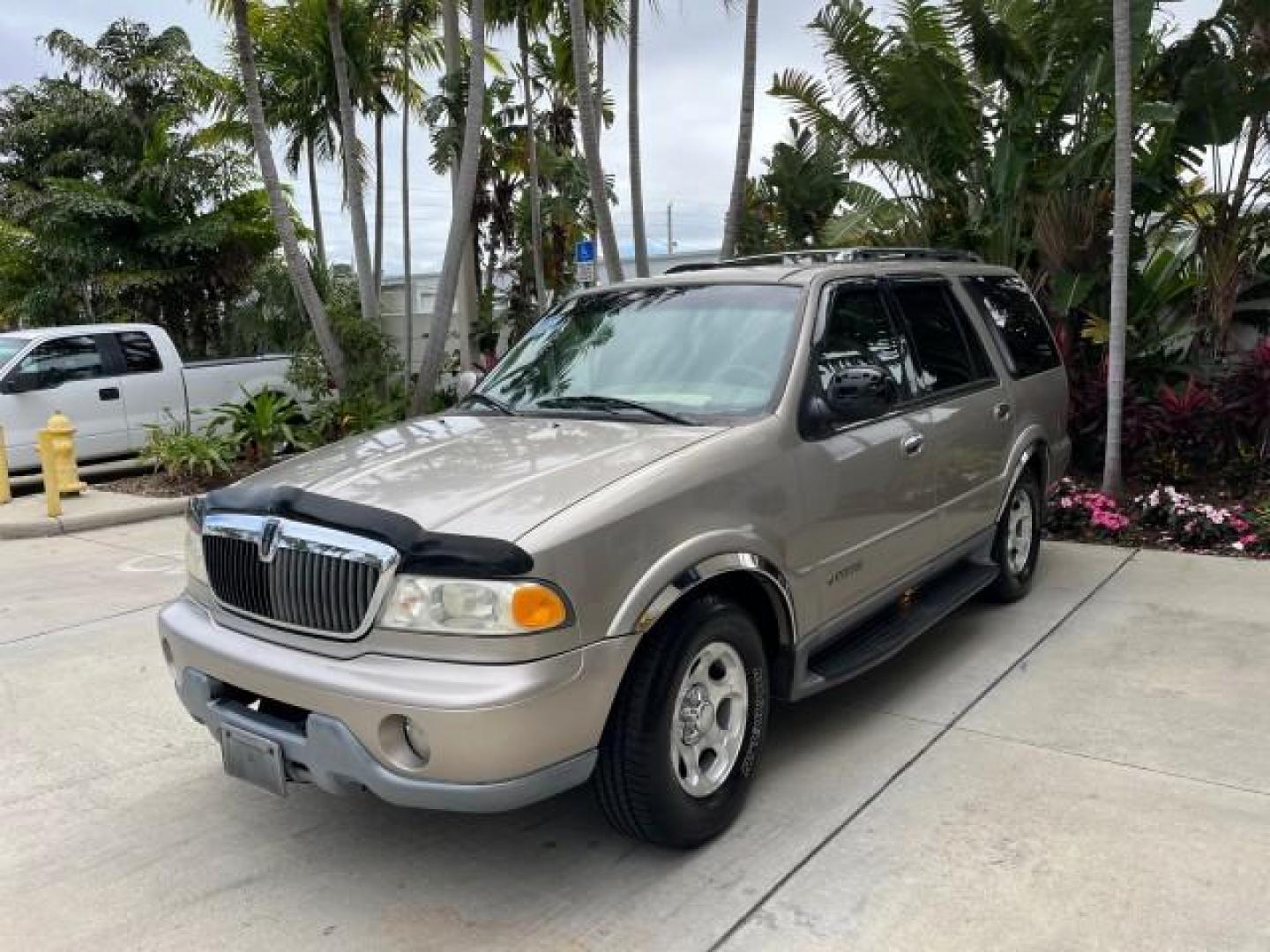 2001 Mineral Grey Metallic /Medium Graphite Lincoln Navigator LOW MILES 60,720 (5LMEU27AX1L) with an 5.4L DOHC 32-Valve V8 Intech Engine engine, Automatic transmission, located at 4701 North Dixie Hwy, Pompano Beach, FL, 33064, (954) 422-2889, 26.240938, -80.123474 - 2001 LINCOLN NAVIGATOR NEW $ 45,395 ROAD READY VIN: 5LMEU27AX1LJ06792 NO ACCIDENTS NO RECALLS 4 DOOR WAGON/SPORT UTILITY LOW MILES 60,720 5.4L V8 5.4L V8 F DOHC POWER LEATHER SEATS 3 ROW GASOLINE 27 SERVICE RECORDS REAR WHEEL DRIVE BACK UP SENSORS POWER MIRRORS DUAL AC Air Suspension Alloy Wheels An - Photo#3