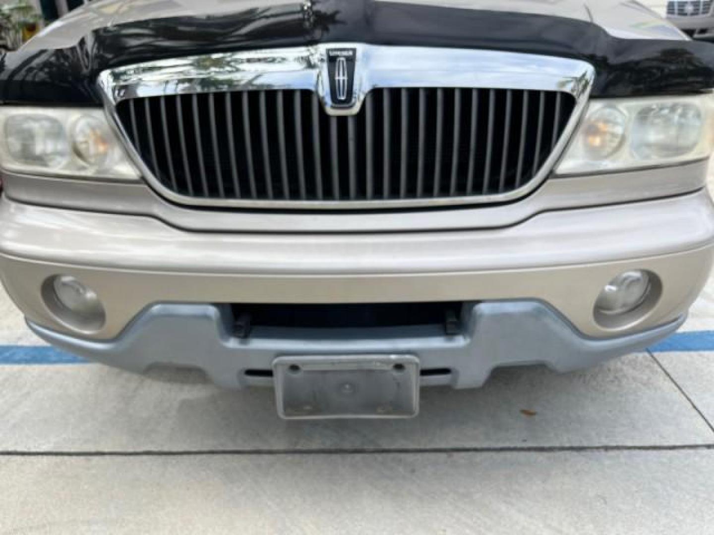 2001 Mineral Grey Metallic /Medium Graphite Lincoln Navigator LOW MILES 60,720 (5LMEU27AX1L) with an 5.4L DOHC 32-Valve V8 Intech Engine engine, Automatic transmission, located at 4701 North Dixie Hwy, Pompano Beach, FL, 33064, (954) 422-2889, 26.240938, -80.123474 - 2001 LINCOLN NAVIGATOR NEW $ 45,395 ROAD READY VIN: 5LMEU27AX1LJ06792 NO ACCIDENTS NO RECALLS 4 DOOR WAGON/SPORT UTILITY LOW MILES 60,720 5.4L V8 5.4L V8 F DOHC POWER LEATHER SEATS 3 ROW GASOLINE 27 SERVICE RECORDS REAR WHEEL DRIVE BACK UP SENSORS POWER MIRRORS DUAL AC Air Suspension Alloy Wheels An - Photo#85