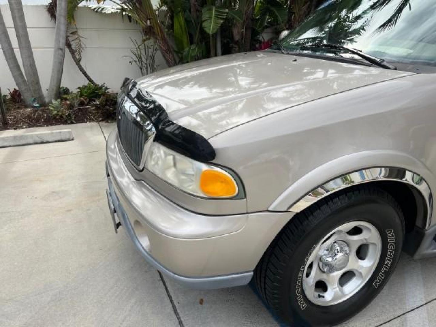 2001 Mineral Grey Metallic /Medium Graphite Lincoln Navigator LOW MILES 60,720 (5LMEU27AX1L) with an 5.4L DOHC 32-Valve V8 Intech Engine engine, Automatic transmission, located at 4701 North Dixie Hwy, Pompano Beach, FL, 33064, (954) 422-2889, 26.240938, -80.123474 - 2001 LINCOLN NAVIGATOR NEW $ 45,395 ROAD READY VIN: 5LMEU27AX1LJ06792 NO ACCIDENTS NO RECALLS 4 DOOR WAGON/SPORT UTILITY LOW MILES 60,720 5.4L V8 5.4L V8 F DOHC POWER LEATHER SEATS 3 ROW GASOLINE 27 SERVICE RECORDS REAR WHEEL DRIVE BACK UP SENSORS POWER MIRRORS DUAL AC Air Suspension Alloy Wheels An - Photo#90