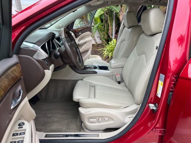 2010 Crystal Red Tintcoat /Shale w/Ebony upper accents Cadillac SRX Luxury Collection LOW MILES 76,601 (3GYFNAEY7AS) with an 3.0L VVT DOHC V6 SIDI Engine engine, Automatic transmission, located at 4701 North Dixie Hwy, Pompano Beach, FL, 33064, (954) 422-2889, 26.240938, -80.123474 - OUR WEBPAGE FLORIDACARS1.COM HAS OVER 100 PHOTOS AND FREE CARFAX LINK 2010 CADILLAC SRX LUXURY COLLECTION NEW $ 40,505 ROAD READY VIN: 3GYFNAEY7AS640260 NO RECALLS BLUETOOTH 4 DOOR WAGON/SPORT UTILITY PARK SENSORS DVD 3.0L V6 F DOHC 24V PUSH BUTTON START POWER HEATED LEATHER SEATS GASOLINE FLORIDA O - Photo#10