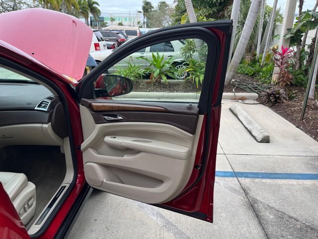 2010 Crystal Red Tintcoat /Shale w/Ebony upper accents Cadillac SRX Luxury Collection LOW MILES 76,601 (3GYFNAEY7AS) with an 3.0L VVT DOHC V6 SIDI Engine engine, Automatic transmission, located at 4701 North Dixie Hwy, Pompano Beach, FL, 33064, (954) 422-2889, 26.240938, -80.123474 - OUR WEBPAGE FLORIDACARS1.COM HAS OVER 100 PHOTOS AND FREE CARFAX LINK 2010 CADILLAC SRX LUXURY COLLECTION NEW $ 40,505 ROAD READY VIN: 3GYFNAEY7AS640260 NO RECALLS BLUETOOTH 4 DOOR WAGON/SPORT UTILITY PARK SENSORS DVD 3.0L V6 F DOHC 24V PUSH BUTTON START POWER HEATED LEATHER SEATS GASOLINE FLORIDA O - Photo#11