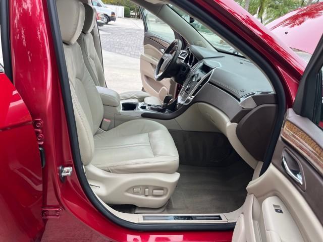 2010 Crystal Red Tintcoat /Shale w/Ebony upper accents Cadillac SRX Luxury Collection LOW MILES 76,601 (3GYFNAEY7AS) with an 3.0L VVT DOHC V6 SIDI Engine engine, Automatic transmission, located at 4701 North Dixie Hwy, Pompano Beach, FL, 33064, (954) 422-2889, 26.240938, -80.123474 - OUR WEBPAGE FLORIDACARS1.COM HAS OVER 100 PHOTOS AND FREE CARFAX LINK 2010 CADILLAC SRX LUXURY COLLECTION NEW $ 40,505 ROAD READY VIN: 3GYFNAEY7AS640260 NO RECALLS BLUETOOTH 4 DOOR WAGON/SPORT UTILITY PARK SENSORS DVD 3.0L V6 F DOHC 24V PUSH BUTTON START POWER HEATED LEATHER SEATS GASOLINE FLORIDA O - Photo#12