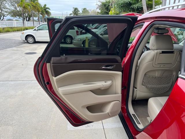 2010 Crystal Red Tintcoat /Shale w/Ebony upper accents Cadillac SRX Luxury Collection LOW MILES 76,601 (3GYFNAEY7AS) with an 3.0L VVT DOHC V6 SIDI Engine engine, Automatic transmission, located at 4701 North Dixie Hwy, Pompano Beach, FL, 33064, (954) 422-2889, 26.240938, -80.123474 - OUR WEBPAGE FLORIDACARS1.COM HAS OVER 100 PHOTOS AND FREE CARFAX LINK 2010 CADILLAC SRX LUXURY COLLECTION NEW $ 40,505 ROAD READY VIN: 3GYFNAEY7AS640260 NO RECALLS BLUETOOTH 4 DOOR WAGON/SPORT UTILITY PARK SENSORS DVD 3.0L V6 F DOHC 24V PUSH BUTTON START POWER HEATED LEATHER SEATS GASOLINE FLORIDA O - Photo#13