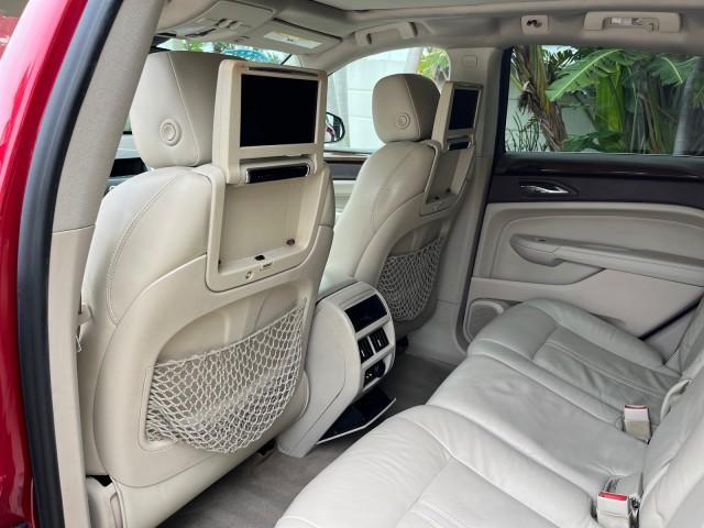 2010 Crystal Red Tintcoat /Shale w/Ebony upper accents Cadillac SRX Luxury Collection LOW MILES 76,601 (3GYFNAEY7AS) with an 3.0L VVT DOHC V6 SIDI Engine engine, Automatic transmission, located at 4701 North Dixie Hwy, Pompano Beach, FL, 33064, (954) 422-2889, 26.240938, -80.123474 - OUR WEBPAGE FLORIDACARS1.COM HAS OVER 100 PHOTOS AND FREE CARFAX LINK 2010 CADILLAC SRX LUXURY COLLECTION NEW $ 40,505 ROAD READY VIN: 3GYFNAEY7AS640260 NO RECALLS BLUETOOTH 4 DOOR WAGON/SPORT UTILITY PARK SENSORS DVD 3.0L V6 F DOHC 24V PUSH BUTTON START POWER HEATED LEATHER SEATS GASOLINE FLORIDA O - Photo#16