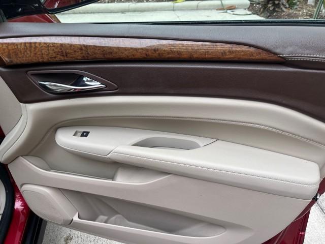 2010 Crystal Red Tintcoat /Shale w/Ebony upper accents Cadillac SRX Luxury Collection LOW MILES 76,601 (3GYFNAEY7AS) with an 3.0L VVT DOHC V6 SIDI Engine engine, Automatic transmission, located at 4701 North Dixie Hwy, Pompano Beach, FL, 33064, (954) 422-2889, 26.240938, -80.123474 - OUR WEBPAGE FLORIDACARS1.COM HAS OVER 100 PHOTOS AND FREE CARFAX LINK 2010 CADILLAC SRX LUXURY COLLECTION NEW $ 40,505 ROAD READY VIN: 3GYFNAEY7AS640260 NO RECALLS BLUETOOTH 4 DOOR WAGON/SPORT UTILITY PARK SENSORS DVD 3.0L V6 F DOHC 24V PUSH BUTTON START POWER HEATED LEATHER SEATS GASOLINE FLORIDA O - Photo#24