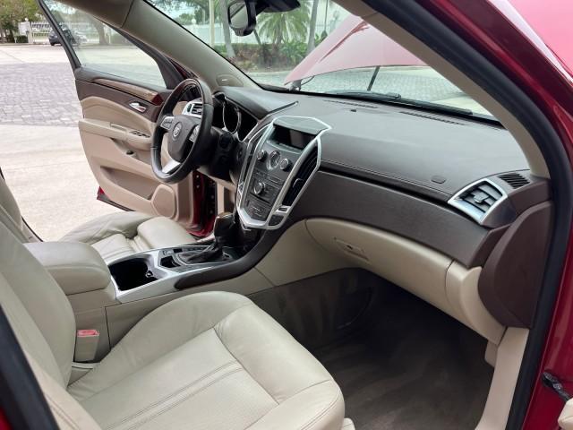 2010 Crystal Red Tintcoat /Shale w/Ebony upper accents Cadillac SRX Luxury Collection LOW MILES 76,601 (3GYFNAEY7AS) with an 3.0L VVT DOHC V6 SIDI Engine engine, Automatic transmission, located at 4701 North Dixie Hwy, Pompano Beach, FL, 33064, (954) 422-2889, 26.240938, -80.123474 - OUR WEBPAGE FLORIDACARS1.COM HAS OVER 100 PHOTOS AND FREE CARFAX LINK 2010 CADILLAC SRX LUXURY COLLECTION NEW $ 40,505 ROAD READY VIN: 3GYFNAEY7AS640260 NO RECALLS BLUETOOTH 4 DOOR WAGON/SPORT UTILITY PARK SENSORS DVD 3.0L V6 F DOHC 24V PUSH BUTTON START POWER HEATED LEATHER SEATS GASOLINE FLORIDA O - Photo#28