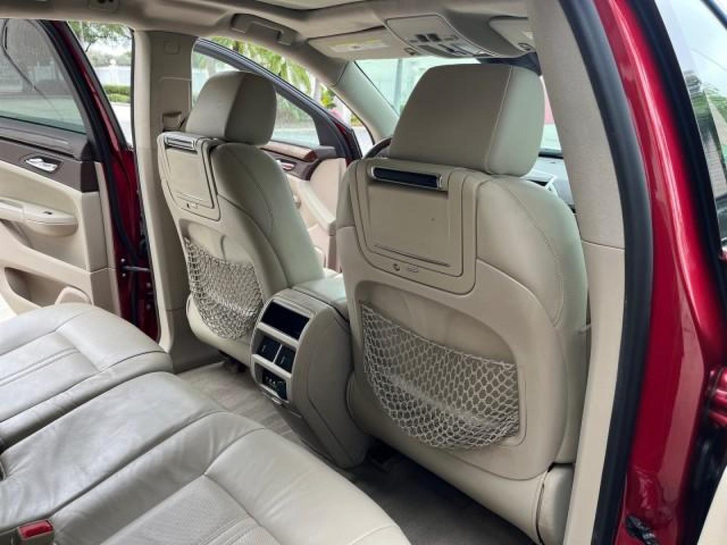 2010 Crystal Red Tintcoat /Shale w/Ebony upper accents Cadillac SRX Luxury Collection LOW MILES 76,601 (3GYFNAEY7AS) with an 3.0L VVT DOHC V6 SIDI Engine engine, Automatic transmission, located at 4701 North Dixie Hwy, Pompano Beach, FL, 33064, (954) 422-2889, 26.240938, -80.123474 - OUR WEBPAGE FLORIDACARS1.COM HAS OVER 100 PHOTOS AND FREE CARFAX LINK 2010 CADILLAC SRX LUXURY COLLECTION NEW $ 40,505 ROAD READY VIN: 3GYFNAEY7AS640260 NO RECALLS BLUETOOTH 4 DOOR WAGON/SPORT UTILITY PARK SENSORS DVD 3.0L V6 F DOHC 24V PUSH BUTTON START POWER HEATED LEATHER SEATS GASOLINE FLORIDA O - Photo#31