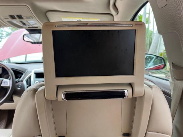 2010 Crystal Red Tintcoat /Shale w/Ebony upper accents Cadillac SRX Luxury Collection LOW MILES 76,601 (3GYFNAEY7AS) with an 3.0L VVT DOHC V6 SIDI Engine engine, Automatic transmission, located at 4701 North Dixie Hwy, Pompano Beach, FL, 33064, (954) 422-2889, 26.240938, -80.123474 - OUR WEBPAGE FLORIDACARS1.COM HAS OVER 100 PHOTOS AND FREE CARFAX LINK 2010 CADILLAC SRX LUXURY COLLECTION NEW $ 40,505 ROAD READY VIN: 3GYFNAEY7AS640260 NO RECALLS BLUETOOTH 4 DOOR WAGON/SPORT UTILITY PARK SENSORS DVD 3.0L V6 F DOHC 24V PUSH BUTTON START POWER HEATED LEATHER SEATS GASOLINE FLORIDA O - Photo#35