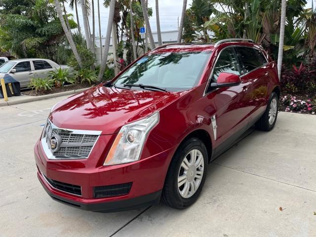 2010 Crystal Red Tintcoat /Shale w/Ebony upper accents Cadillac SRX Luxury Collection LOW MILES 76,601 (3GYFNAEY7AS) with an 3.0L VVT DOHC V6 SIDI Engine engine, Automatic transmission, located at 4701 North Dixie Hwy, Pompano Beach, FL, 33064, (954) 422-2889, 26.240938, -80.123474 - OUR WEBPAGE FLORIDACARS1.COM HAS OVER 100 PHOTOS AND FREE CARFAX LINK 2010 CADILLAC SRX LUXURY COLLECTION NEW $ 40,505 ROAD READY VIN: 3GYFNAEY7AS640260 NO RECALLS BLUETOOTH 4 DOOR WAGON/SPORT UTILITY PARK SENSORS DVD 3.0L V6 F DOHC 24V PUSH BUTTON START POWER HEATED LEATHER SEATS GASOLINE FLORIDA O - Photo#3