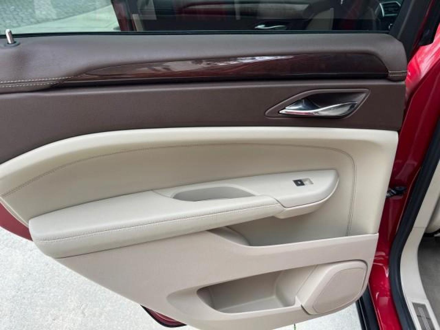 2010 Crystal Red Tintcoat /Shale w/Ebony upper accents Cadillac SRX Luxury Collection LOW MILES 76,601 (3GYFNAEY7AS) with an 3.0L VVT DOHC V6 SIDI Engine engine, Automatic transmission, located at 4701 North Dixie Hwy, Pompano Beach, FL, 33064, (954) 422-2889, 26.240938, -80.123474 - OUR WEBPAGE FLORIDACARS1.COM HAS OVER 100 PHOTOS AND FREE CARFAX LINK 2010 CADILLAC SRX LUXURY COLLECTION NEW $ 40,505 ROAD READY VIN: 3GYFNAEY7AS640260 NO RECALLS BLUETOOTH 4 DOOR WAGON/SPORT UTILITY PARK SENSORS DVD 3.0L V6 F DOHC 24V PUSH BUTTON START POWER HEATED LEATHER SEATS GASOLINE FLORIDA O - Photo#39