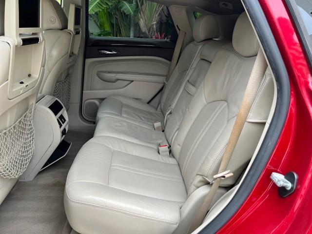 2010 Crystal Red Tintcoat /Shale w/Ebony upper accents Cadillac SRX Luxury Collection LOW MILES 76,601 (3GYFNAEY7AS) with an 3.0L VVT DOHC V6 SIDI Engine engine, Automatic transmission, located at 4701 North Dixie Hwy, Pompano Beach, FL, 33064, (954) 422-2889, 26.240938, -80.123474 - OUR WEBPAGE FLORIDACARS1.COM HAS OVER 100 PHOTOS AND FREE CARFAX LINK 2010 CADILLAC SRX LUXURY COLLECTION NEW $ 40,505 ROAD READY VIN: 3GYFNAEY7AS640260 NO RECALLS BLUETOOTH 4 DOOR WAGON/SPORT UTILITY PARK SENSORS DVD 3.0L V6 F DOHC 24V PUSH BUTTON START POWER HEATED LEATHER SEATS GASOLINE FLORIDA O - Photo#40