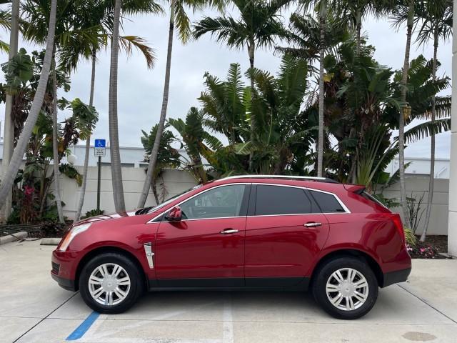 2010 Crystal Red Tintcoat /Shale w/Ebony upper accents Cadillac SRX Luxury Collection LOW MILES 76,601 (3GYFNAEY7AS) with an 3.0L VVT DOHC V6 SIDI Engine engine, Automatic transmission, located at 4701 North Dixie Hwy, Pompano Beach, FL, 33064, (954) 422-2889, 26.240938, -80.123474 - OUR WEBPAGE FLORIDACARS1.COM HAS OVER 100 PHOTOS AND FREE CARFAX LINK 2010 CADILLAC SRX LUXURY COLLECTION NEW $ 40,505 ROAD READY VIN: 3GYFNAEY7AS640260 NO RECALLS BLUETOOTH 4 DOOR WAGON/SPORT UTILITY PARK SENSORS DVD 3.0L V6 F DOHC 24V PUSH BUTTON START POWER HEATED LEATHER SEATS GASOLINE FLORIDA O - Photo#4