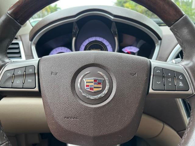 2010 Crystal Red Tintcoat /Shale w/Ebony upper accents Cadillac SRX Luxury Collection LOW MILES 76,601 (3GYFNAEY7AS) with an 3.0L VVT DOHC V6 SIDI Engine engine, Automatic transmission, located at 4701 North Dixie Hwy, Pompano Beach, FL, 33064, (954) 422-2889, 26.240938, -80.123474 - OUR WEBPAGE FLORIDACARS1.COM HAS OVER 100 PHOTOS AND FREE CARFAX LINK 2010 CADILLAC SRX LUXURY COLLECTION NEW $ 40,505 ROAD READY VIN: 3GYFNAEY7AS640260 NO RECALLS BLUETOOTH 4 DOOR WAGON/SPORT UTILITY PARK SENSORS DVD 3.0L V6 F DOHC 24V PUSH BUTTON START POWER HEATED LEATHER SEATS GASOLINE FLORIDA O - Photo#51