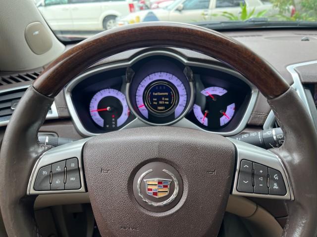 2010 Crystal Red Tintcoat /Shale w/Ebony upper accents Cadillac SRX Luxury Collection LOW MILES 76,601 (3GYFNAEY7AS) with an 3.0L VVT DOHC V6 SIDI Engine engine, Automatic transmission, located at 4701 North Dixie Hwy, Pompano Beach, FL, 33064, (954) 422-2889, 26.240938, -80.123474 - OUR WEBPAGE FLORIDACARS1.COM HAS OVER 100 PHOTOS AND FREE CARFAX LINK 2010 CADILLAC SRX LUXURY COLLECTION NEW $ 40,505 ROAD READY VIN: 3GYFNAEY7AS640260 NO RECALLS BLUETOOTH 4 DOOR WAGON/SPORT UTILITY PARK SENSORS DVD 3.0L V6 F DOHC 24V PUSH BUTTON START POWER HEATED LEATHER SEATS GASOLINE FLORIDA O - Photo#52