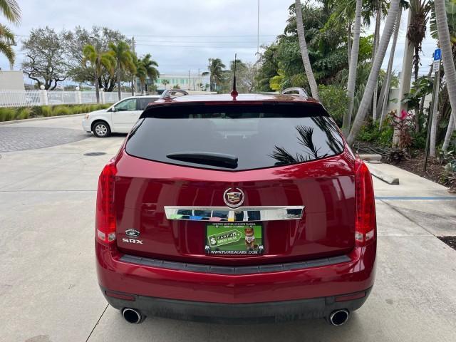 2010 Crystal Red Tintcoat /Shale w/Ebony upper accents Cadillac SRX Luxury Collection LOW MILES 76,601 (3GYFNAEY7AS) with an 3.0L VVT DOHC V6 SIDI Engine engine, Automatic transmission, located at 4701 North Dixie Hwy, Pompano Beach, FL, 33064, (954) 422-2889, 26.240938, -80.123474 - OUR WEBPAGE FLORIDACARS1.COM HAS OVER 100 PHOTOS AND FREE CARFAX LINK 2010 CADILLAC SRX LUXURY COLLECTION NEW $ 40,505 ROAD READY VIN: 3GYFNAEY7AS640260 NO RECALLS BLUETOOTH 4 DOOR WAGON/SPORT UTILITY PARK SENSORS DVD 3.0L V6 F DOHC 24V PUSH BUTTON START POWER HEATED LEATHER SEATS GASOLINE FLORIDA O - Photo#6