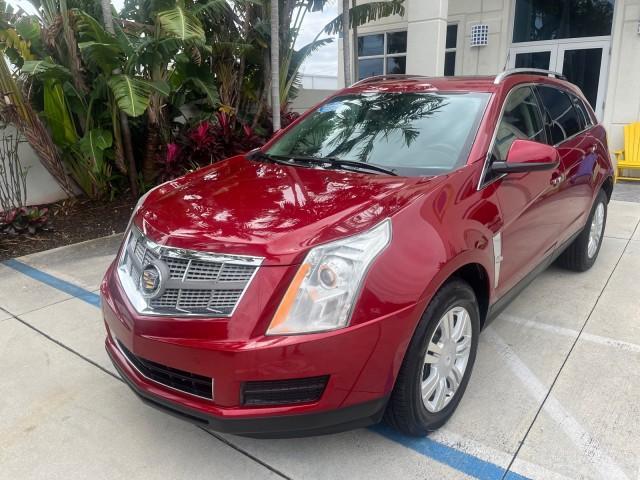 2010 Crystal Red Tintcoat /Shale w/Ebony upper accents Cadillac SRX Luxury Collection LOW MILES 76,601 (3GYFNAEY7AS) with an 3.0L VVT DOHC V6 SIDI Engine engine, Automatic transmission, located at 4701 North Dixie Hwy, Pompano Beach, FL, 33064, (954) 422-2889, 26.240938, -80.123474 - OUR WEBPAGE FLORIDACARS1.COM HAS OVER 100 PHOTOS AND FREE CARFAX LINK 2010 CADILLAC SRX LUXURY COLLECTION NEW $ 40,505 ROAD READY VIN: 3GYFNAEY7AS640260 NO RECALLS BLUETOOTH 4 DOOR WAGON/SPORT UTILITY PARK SENSORS DVD 3.0L V6 F DOHC 24V PUSH BUTTON START POWER HEATED LEATHER SEATS GASOLINE FLORIDA O - Photo#73