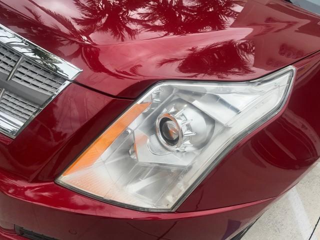2010 Crystal Red Tintcoat /Shale w/Ebony upper accents Cadillac SRX Luxury Collection LOW MILES 76,601 (3GYFNAEY7AS) with an 3.0L VVT DOHC V6 SIDI Engine engine, Automatic transmission, located at 4701 North Dixie Hwy, Pompano Beach, FL, 33064, (954) 422-2889, 26.240938, -80.123474 - OUR WEBPAGE FLORIDACARS1.COM HAS OVER 100 PHOTOS AND FREE CARFAX LINK 2010 CADILLAC SRX LUXURY COLLECTION NEW $ 40,505 ROAD READY VIN: 3GYFNAEY7AS640260 NO RECALLS BLUETOOTH 4 DOOR WAGON/SPORT UTILITY PARK SENSORS DVD 3.0L V6 F DOHC 24V PUSH BUTTON START POWER HEATED LEATHER SEATS GASOLINE FLORIDA O - Photo#75