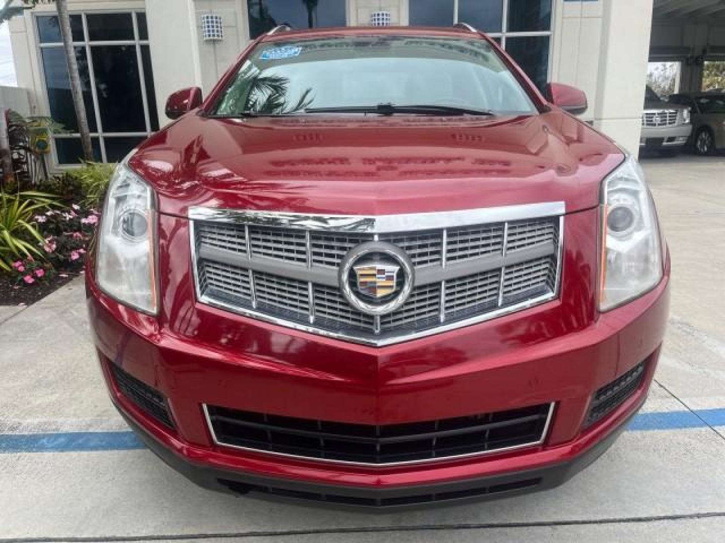 2010 Crystal Red Tintcoat /Shale w/Ebony upper accents Cadillac SRX Luxury Collection LOW MILES 76,601 (3GYFNAEY7AS) with an 3.0L VVT DOHC V6 SIDI Engine engine, Automatic transmission, located at 4701 North Dixie Hwy, Pompano Beach, FL, 33064, (954) 422-2889, 26.240938, -80.123474 - OUR WEBPAGE FLORIDACARS1.COM HAS OVER 100 PHOTOS AND FREE CARFAX LINK 2010 CADILLAC SRX LUXURY COLLECTION NEW $ 40,505 ROAD READY VIN: 3GYFNAEY7AS640260 NO RECALLS BLUETOOTH 4 DOOR WAGON/SPORT UTILITY PARK SENSORS DVD 3.0L V6 F DOHC 24V PUSH BUTTON START POWER HEATED LEATHER SEATS GASOLINE FLORIDA O - Photo#77