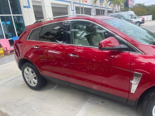 2010 Crystal Red Tintcoat /Shale w/Ebony upper accents Cadillac SRX Luxury Collection LOW MILES 76,601 (3GYFNAEY7AS) with an 3.0L VVT DOHC V6 SIDI Engine engine, Automatic transmission, located at 4701 North Dixie Hwy, Pompano Beach, FL, 33064, (954) 422-2889, 26.240938, -80.123474 - OUR WEBPAGE FLORIDACARS1.COM HAS OVER 100 PHOTOS AND FREE CARFAX LINK 2010 CADILLAC SRX LUXURY COLLECTION NEW $ 40,505 ROAD READY VIN: 3GYFNAEY7AS640260 NO RECALLS BLUETOOTH 4 DOOR WAGON/SPORT UTILITY PARK SENSORS DVD 3.0L V6 F DOHC 24V PUSH BUTTON START POWER HEATED LEATHER SEATS GASOLINE FLORIDA O - Photo#88