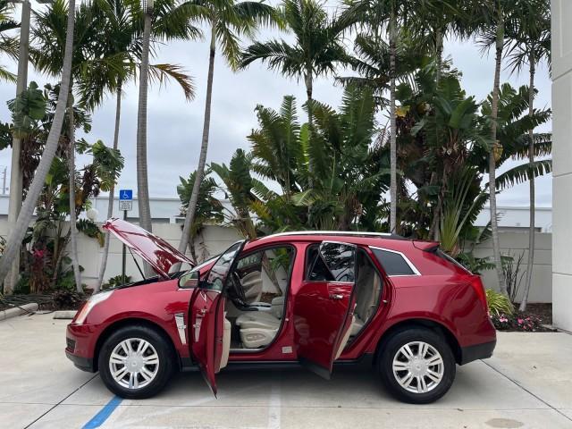 2010 Crystal Red Tintcoat /Shale w/Ebony upper accents Cadillac SRX Luxury Collection LOW MILES 76,601 (3GYFNAEY7AS) with an 3.0L VVT DOHC V6 SIDI Engine engine, Automatic transmission, located at 4701 North Dixie Hwy, Pompano Beach, FL, 33064, (954) 422-2889, 26.240938, -80.123474 - OUR WEBPAGE FLORIDACARS1.COM HAS OVER 100 PHOTOS AND FREE CARFAX LINK 2010 CADILLAC SRX LUXURY COLLECTION NEW $ 40,505 ROAD READY VIN: 3GYFNAEY7AS640260 NO RECALLS BLUETOOTH 4 DOOR WAGON/SPORT UTILITY PARK SENSORS DVD 3.0L V6 F DOHC 24V PUSH BUTTON START POWER HEATED LEATHER SEATS GASOLINE FLORIDA O - Photo#8