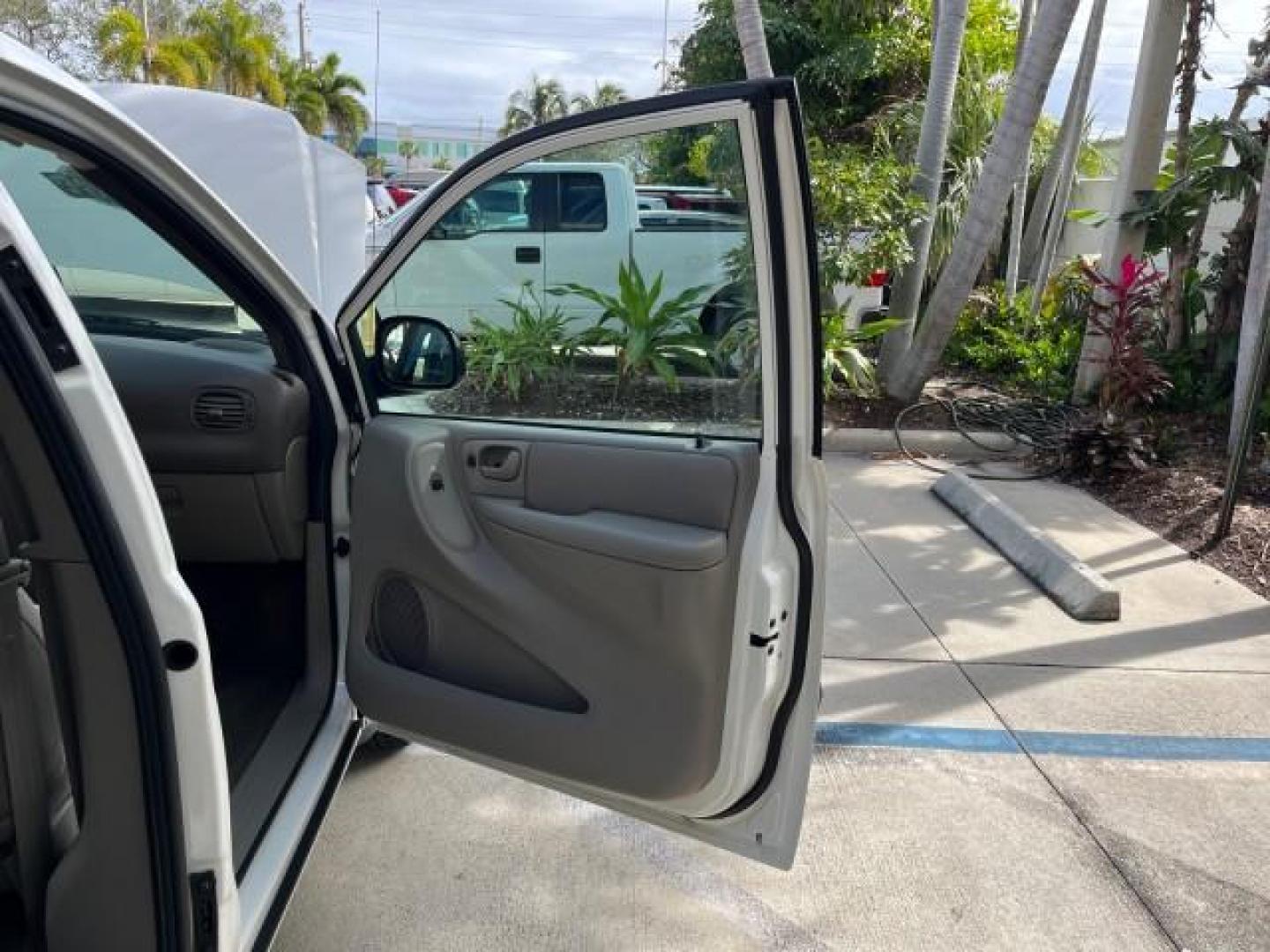 2003 Stone White /Sandstone Chrysler Voyager 1 FL LX LOW MILES 75,819 (1C4GJ45393B) with an 3.3L OHV Flex-Fuel V6 Engine engine, Automatic transmission, located at 4701 North Dixie Hwy, Pompano Beach, FL, 33064, (954) 422-2889, 26.240938, -80.123474 - 2003 CHRYSLER VOYAGER LX POPULAR NON SMOKER ROAD READY 3.3L V6 VIN: 1C4GJ45393B133015 NO RECALLS VAN 1 OWNER FLORIDA 3.3L V6 F SOHC 12V LOW MILES 75,819 GASOLINE 15 SERVICE RECORDS FRONT WHEEL DRIVE 3 ROW SEATS Approach Lights FWD Front Bucket Seats Rear Privacy Glass THIS IS ONE OF THE NICEST CHRYS - Photo#11