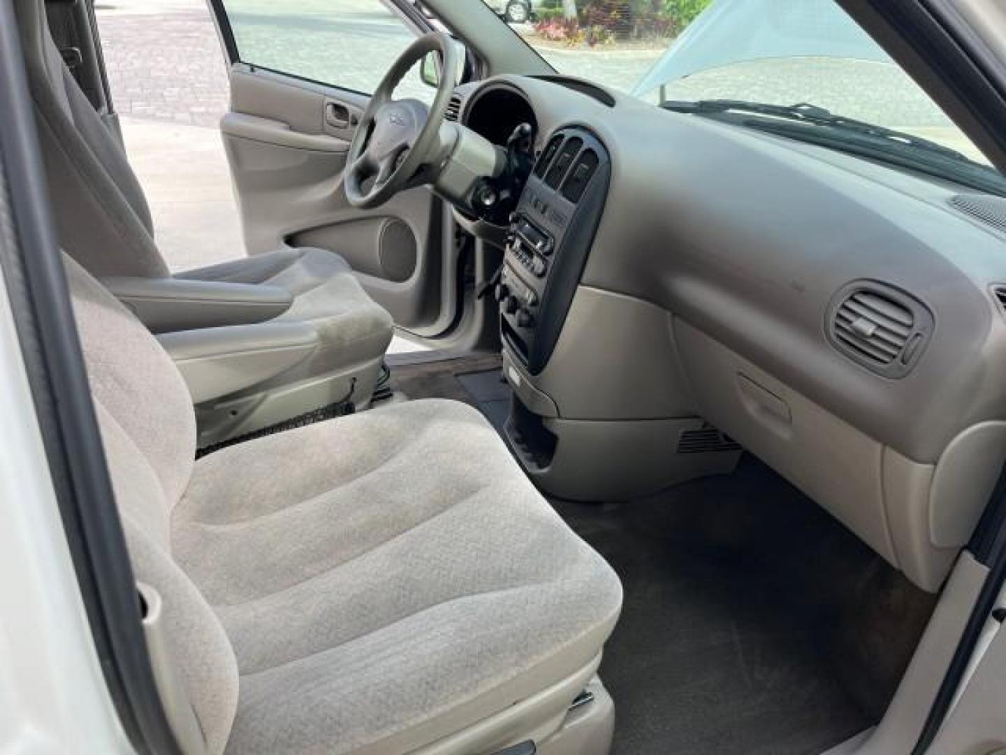 2003 Stone White /Sandstone Chrysler Voyager 1 FL LX LOW MILES 75,819 (1C4GJ45393B) with an 3.3L OHV Flex-Fuel V6 Engine engine, Automatic transmission, located at 4701 North Dixie Hwy, Pompano Beach, FL, 33064, (954) 422-2889, 26.240938, -80.123474 - 2003 CHRYSLER VOYAGER LX POPULAR NON SMOKER ROAD READY 3.3L V6 VIN: 1C4GJ45393B133015 NO RECALLS VAN 1 OWNER FLORIDA 3.3L V6 F SOHC 12V LOW MILES 75,819 GASOLINE 15 SERVICE RECORDS FRONT WHEEL DRIVE 3 ROW SEATS Approach Lights FWD Front Bucket Seats Rear Privacy Glass THIS IS ONE OF THE NICEST CHRYS - Photo#26